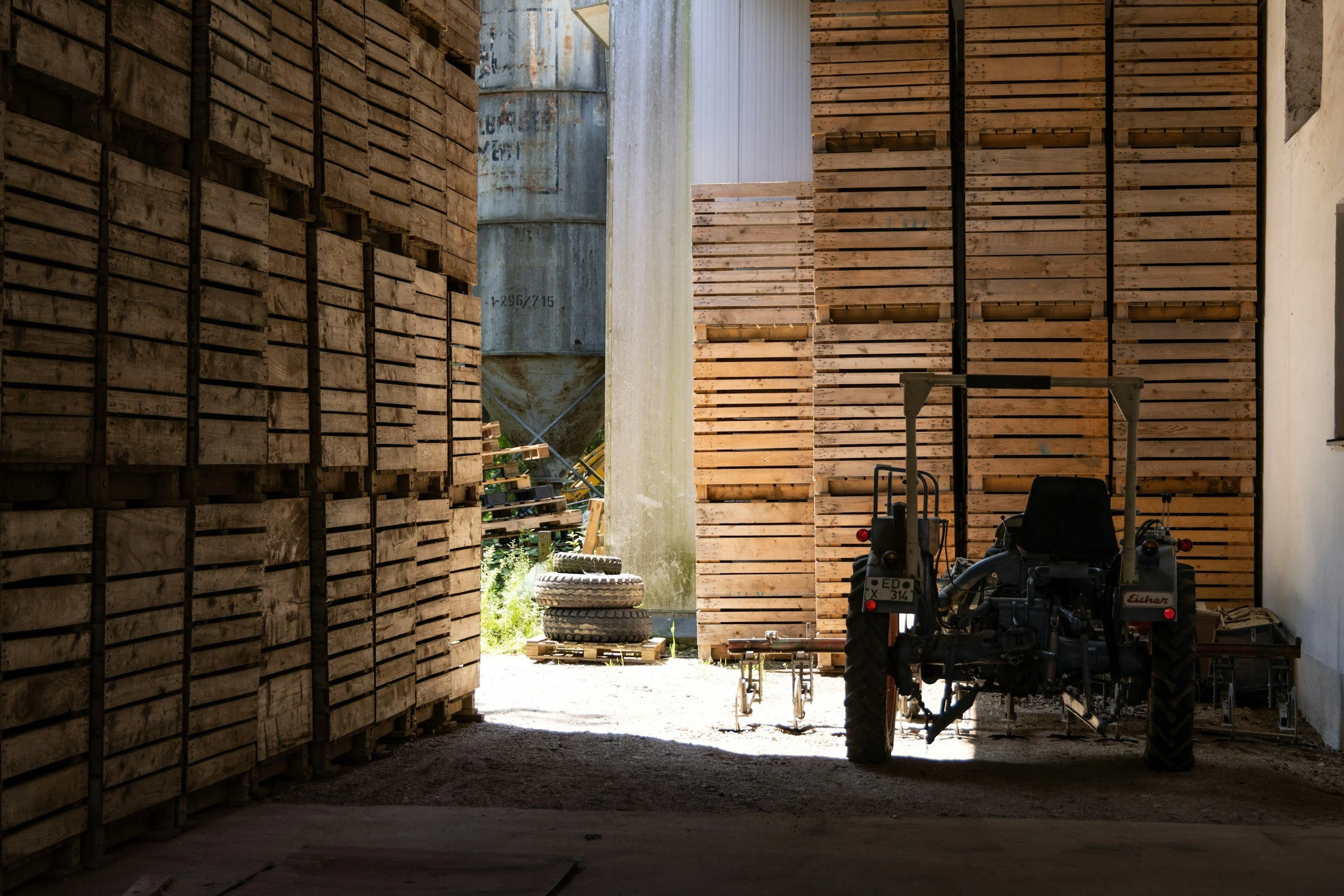 A local timber yard and storage warehouse supplying raw wood materials for architectural projects