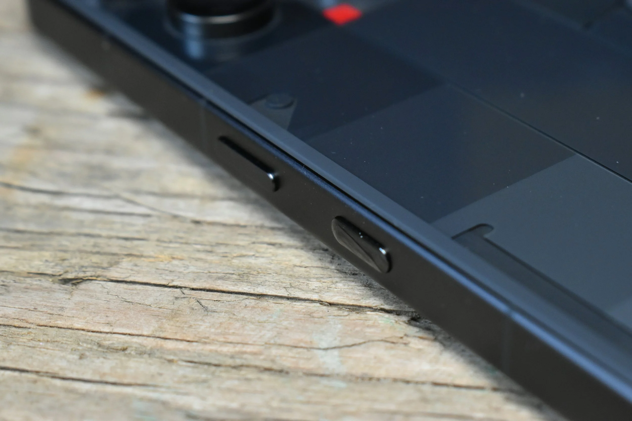 Close-up of a phone volume button