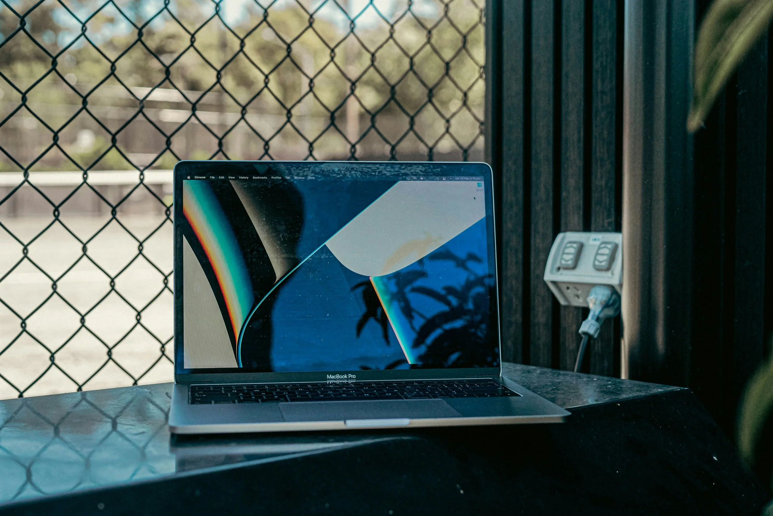 MacBook with a damaged laptop screen