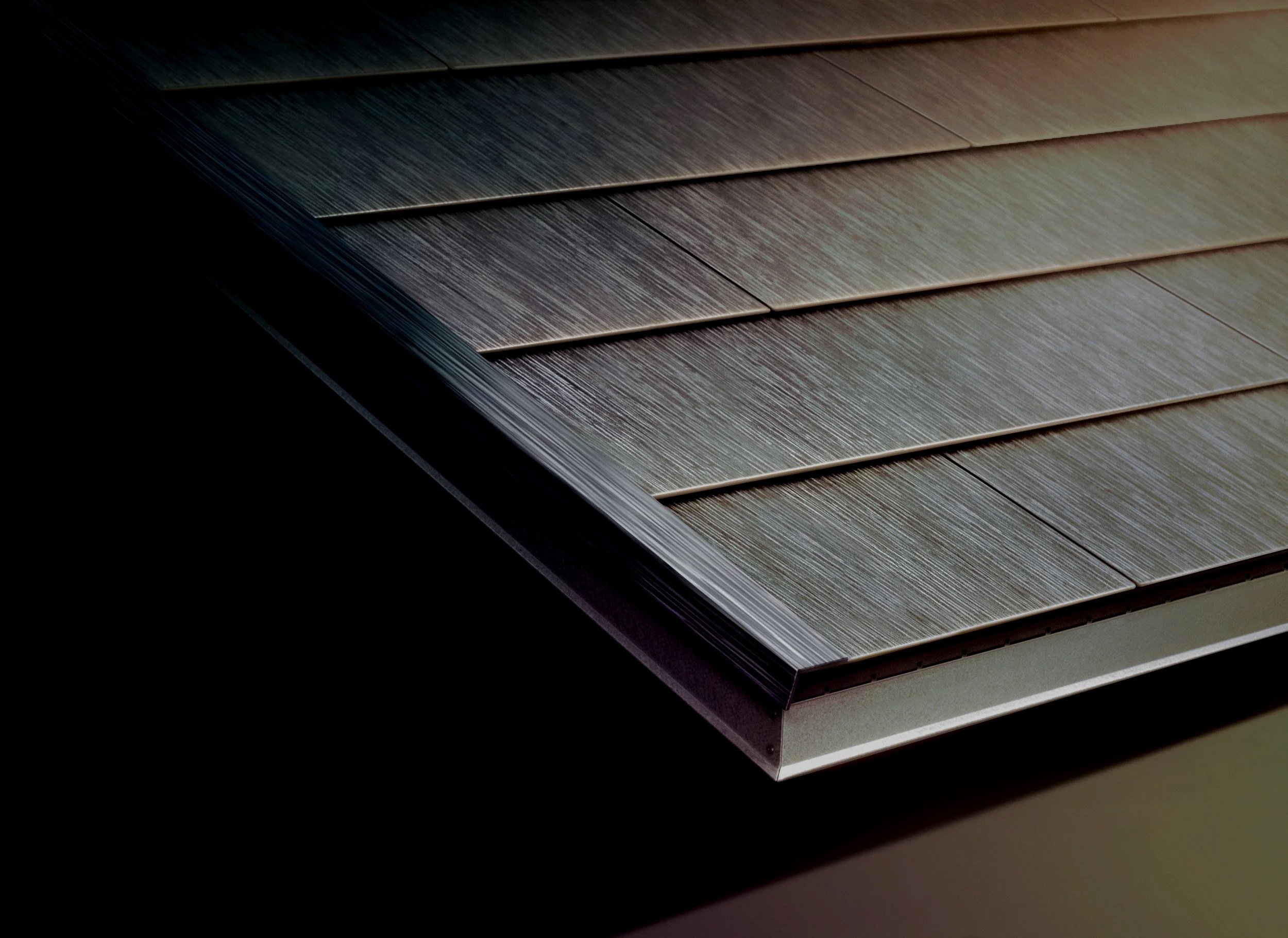 Close-up of a wooden louvered vent with horizontal slats, showing a metallic finish and textured wood grain.