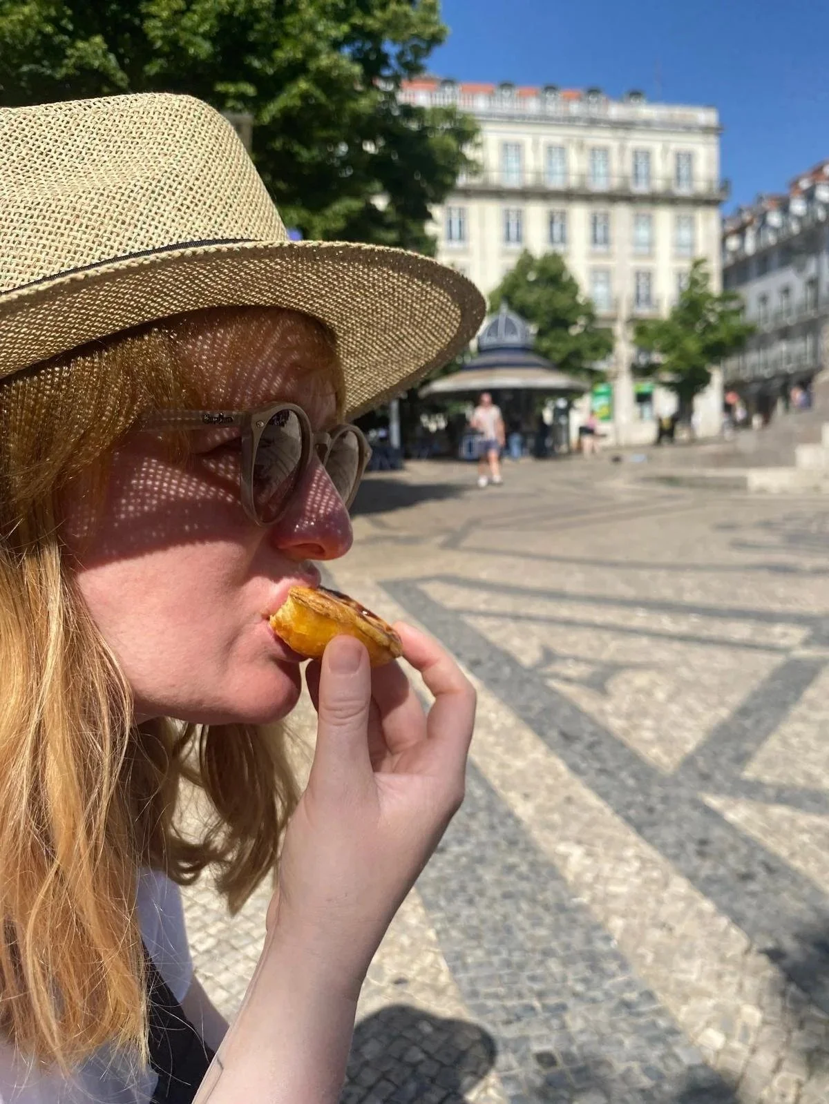 Me eating a pasteis de nata in Porto.jpg