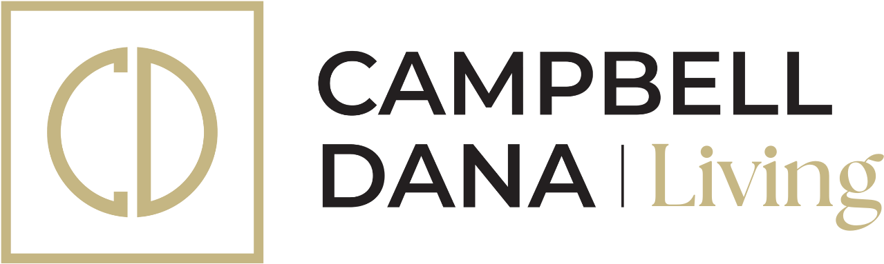 Campbell Dana Living logo with a circular icon containing a vertical line and symmetrical shapes, in black and gold colors.
