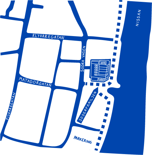 Map showing streets, a building, and a water body on the right side.