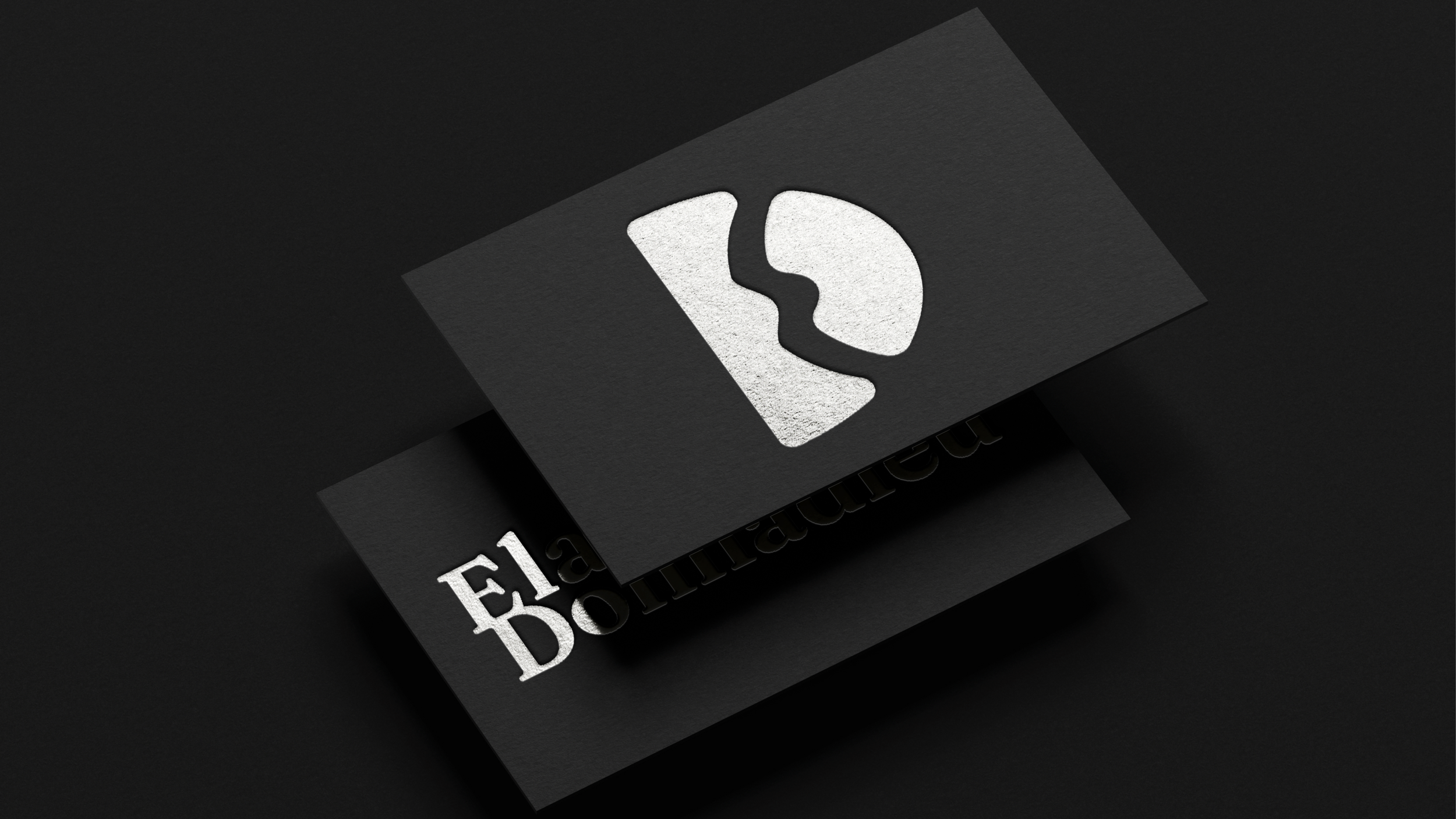 Cartes de visite en noir avec logo Elaura Donnadieu, graphiste, illustratrice et artiste peintre.