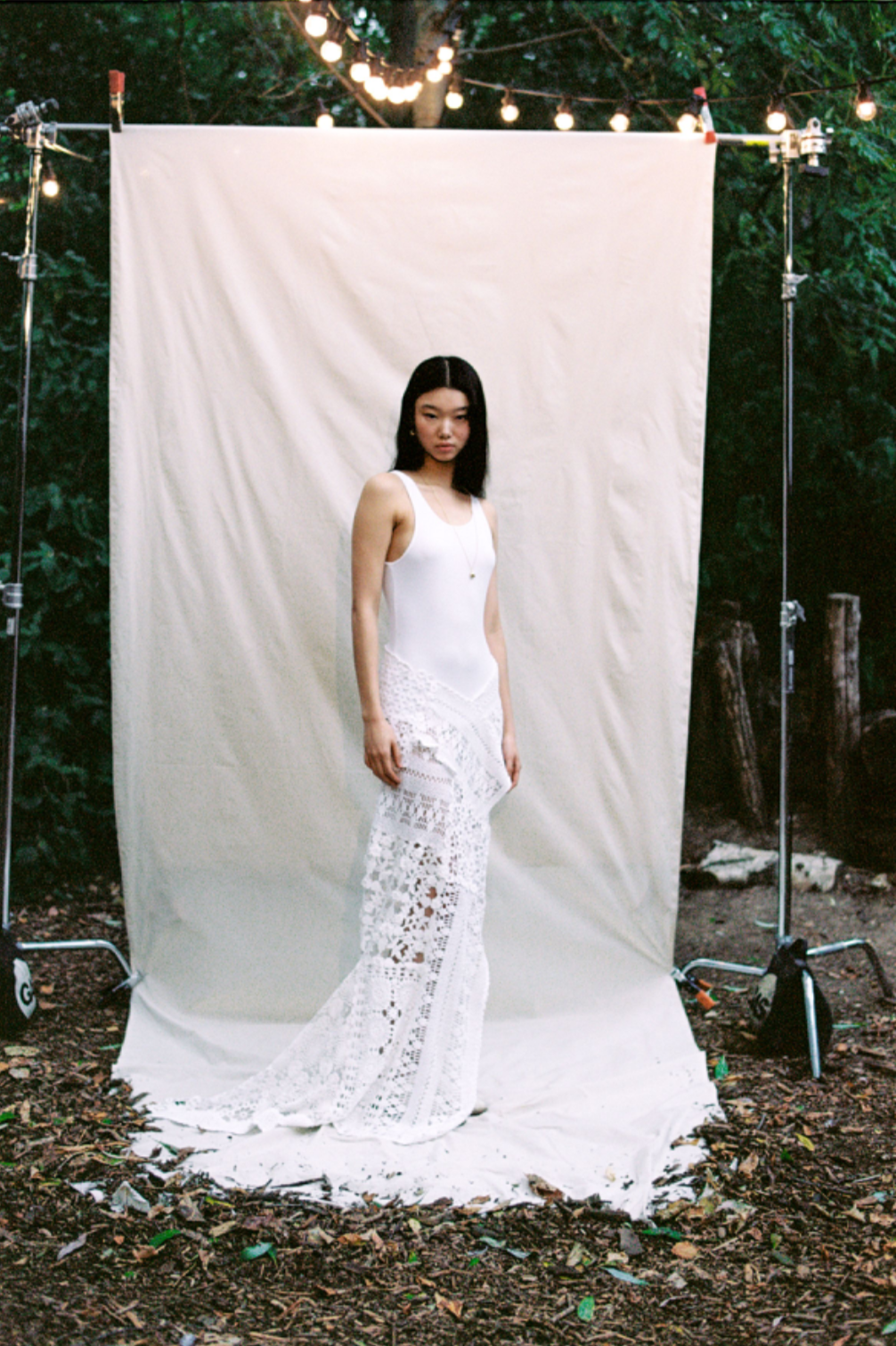 Runway look from Holzweiler SS24 featuring hand-crocheted dress developed as a showpiece garment