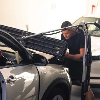 Jared Tweed Dent Repairs Owner and paintless dent repair specialist in workshop