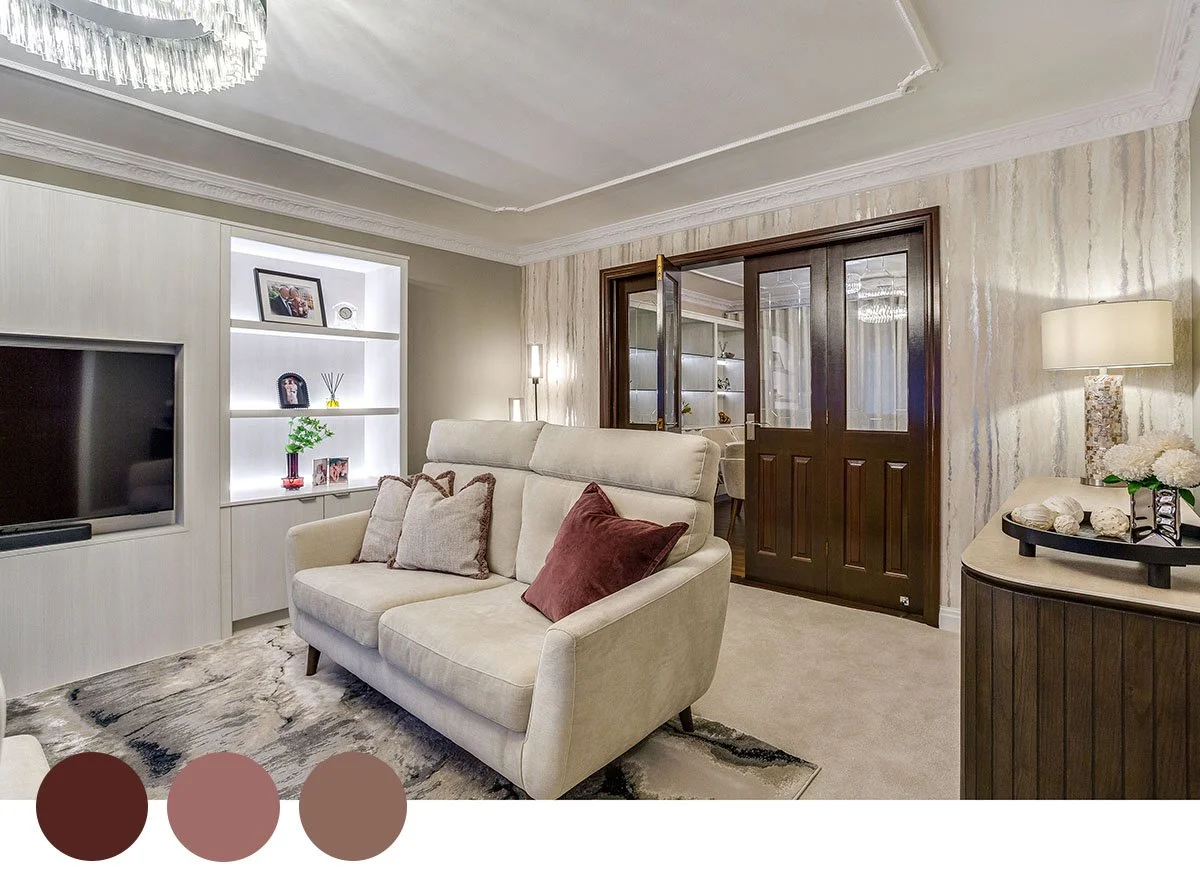 Maroon tones warm up this neutral room