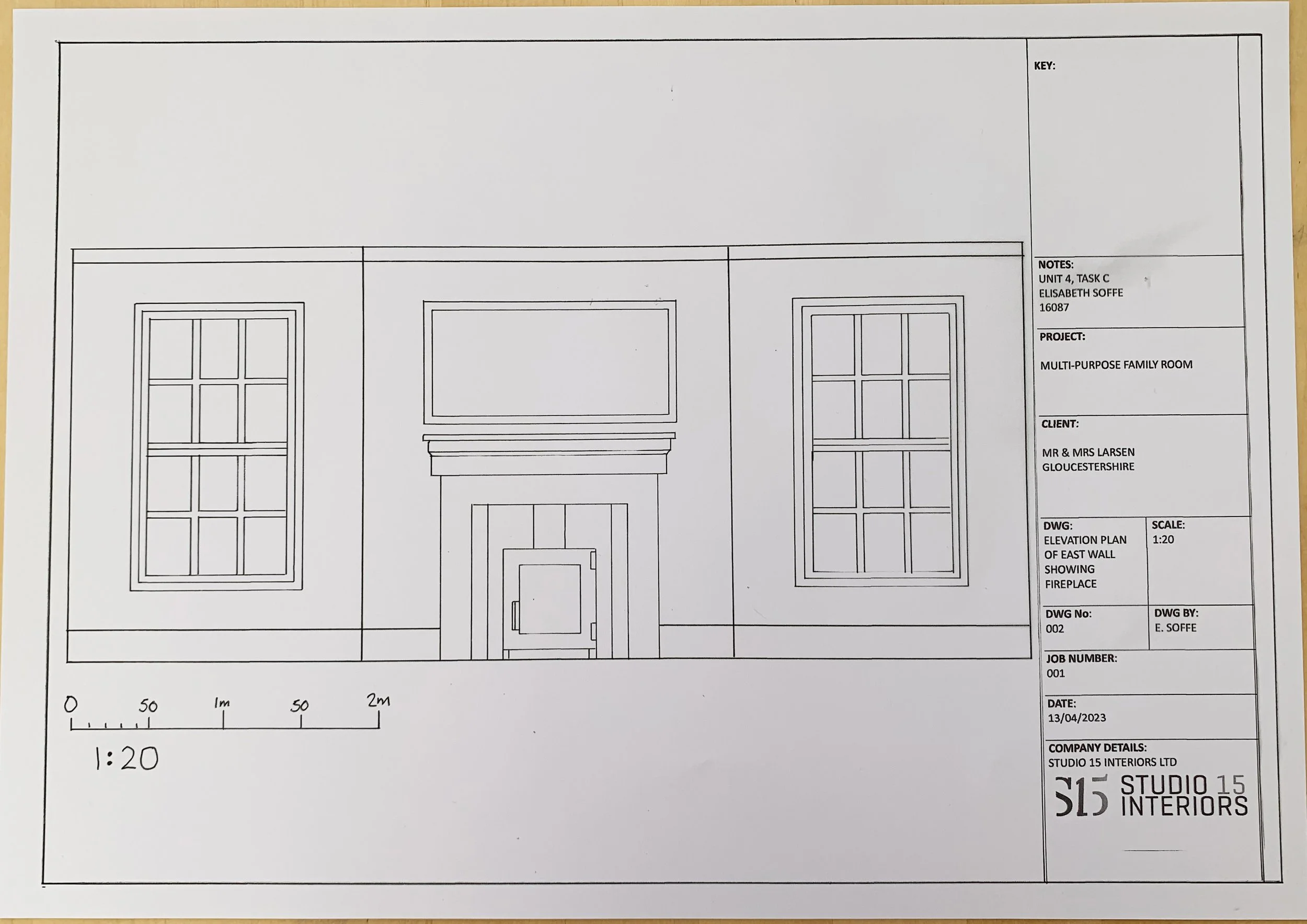 Hand drawn elevation plan showing wall with fireplace
