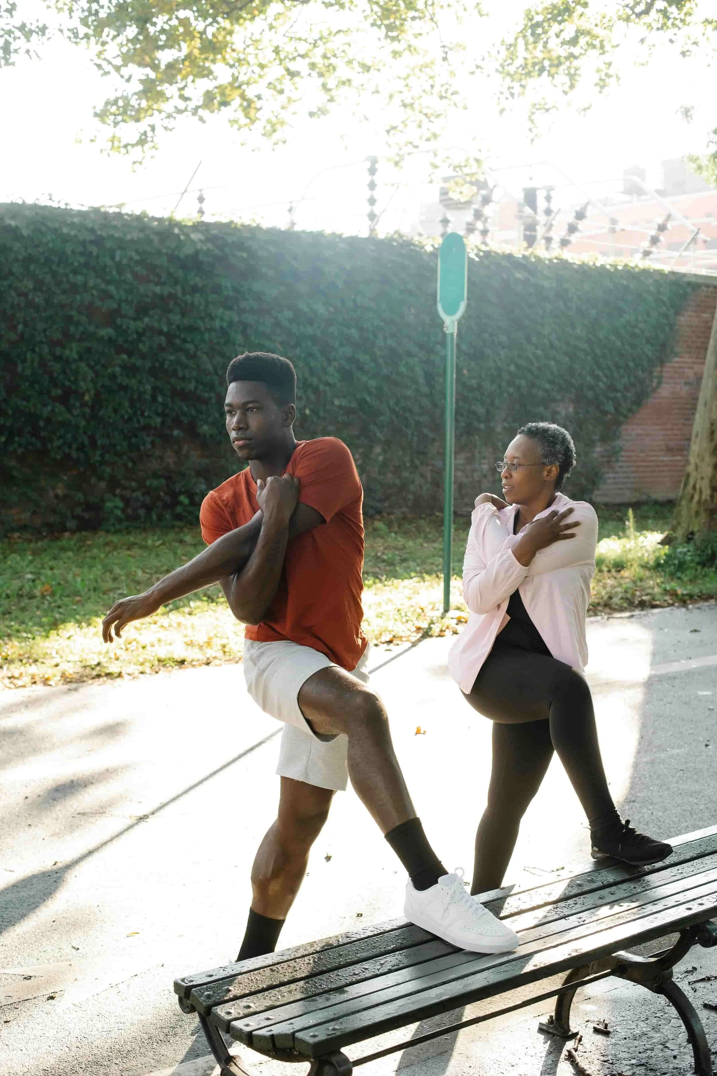 A young man while exercising with his mother.  She just received a PRP pain management solution.