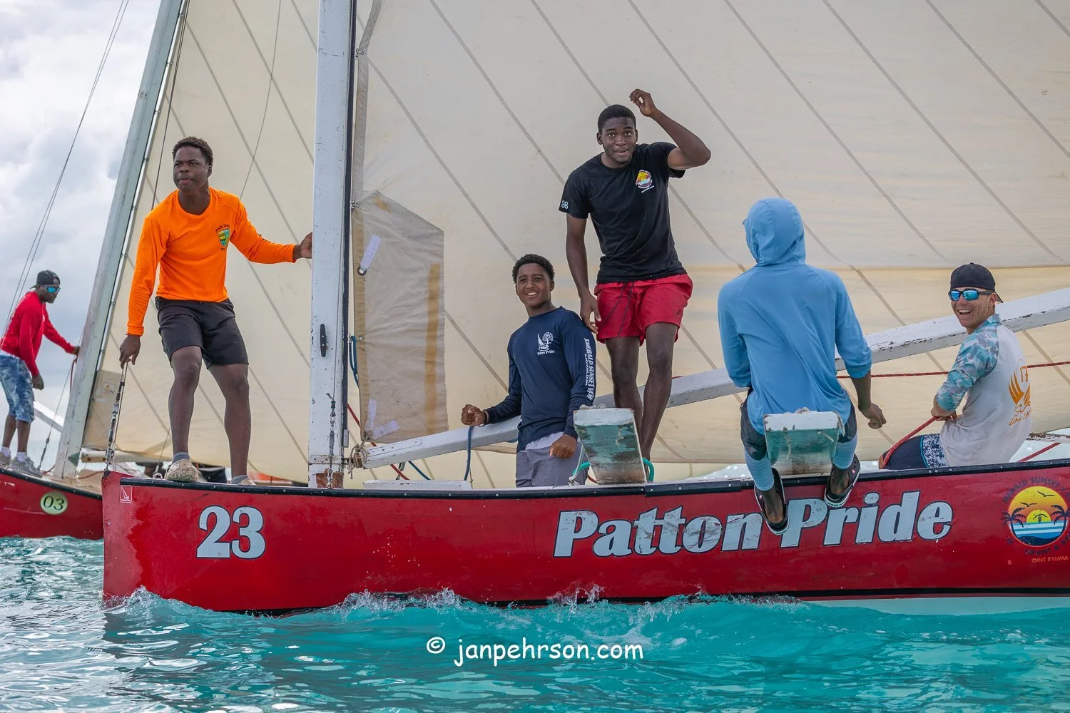 October 2025, Black Point, Exuma, Bahamas, Black Point Regatta, Final C-Class Race Finish. Swirling Winds in Squalls Brought Chaos!