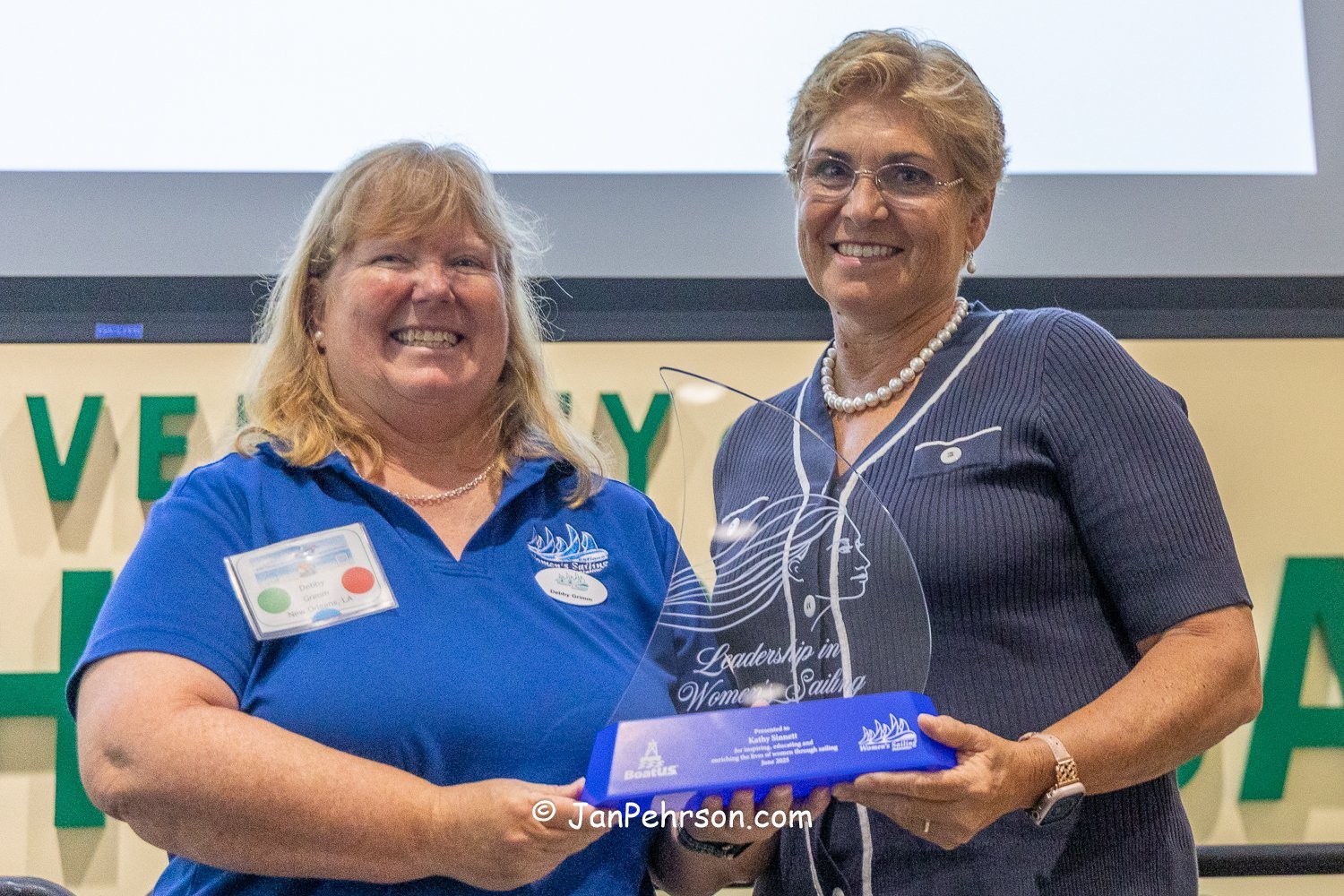 Kathy Sinnett, Winner of the 2025 BoatUS/NWSA Leadership in Women's Sailing Award, presented by Debby Grimm