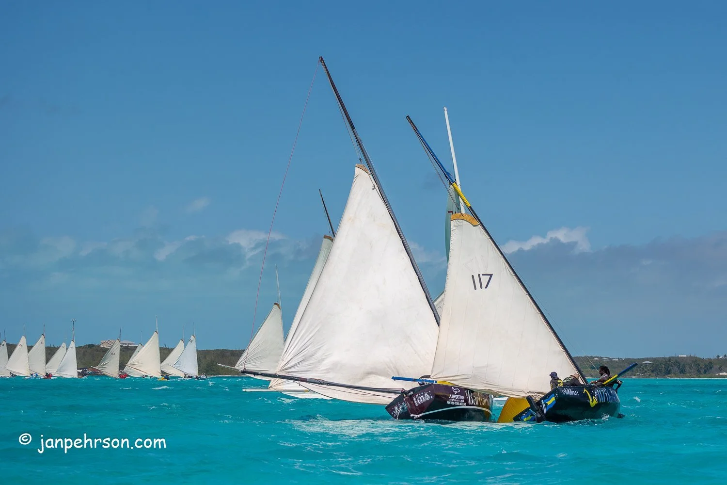 April 2024, George Town, Bahamas, National Family Island Regatta, C-Class, Barbarian II and Unca John, from Acklins