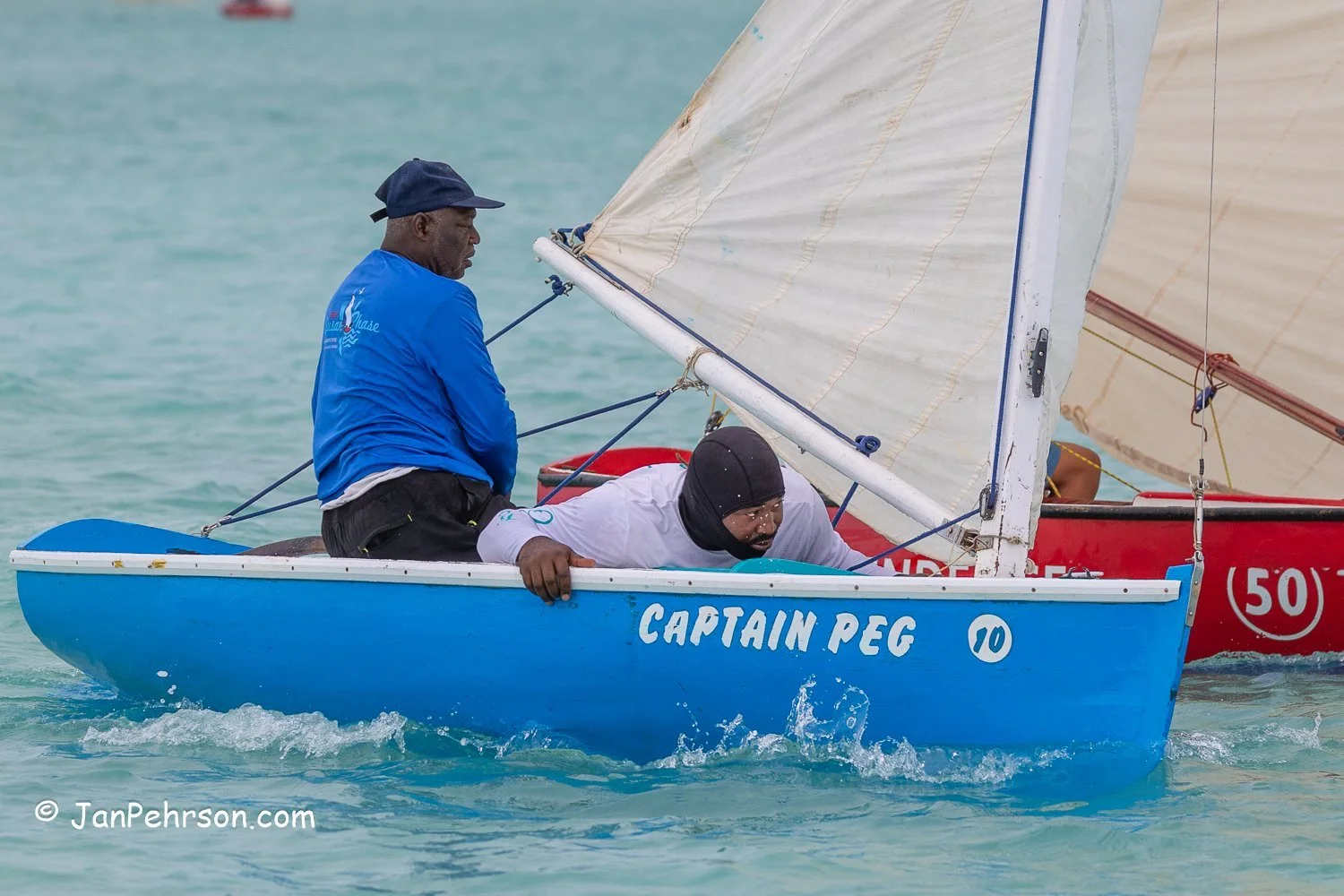 April 2025, George Town, Bahamas, National Family Island Regatta, E-Class, Captain Peg, from Andros