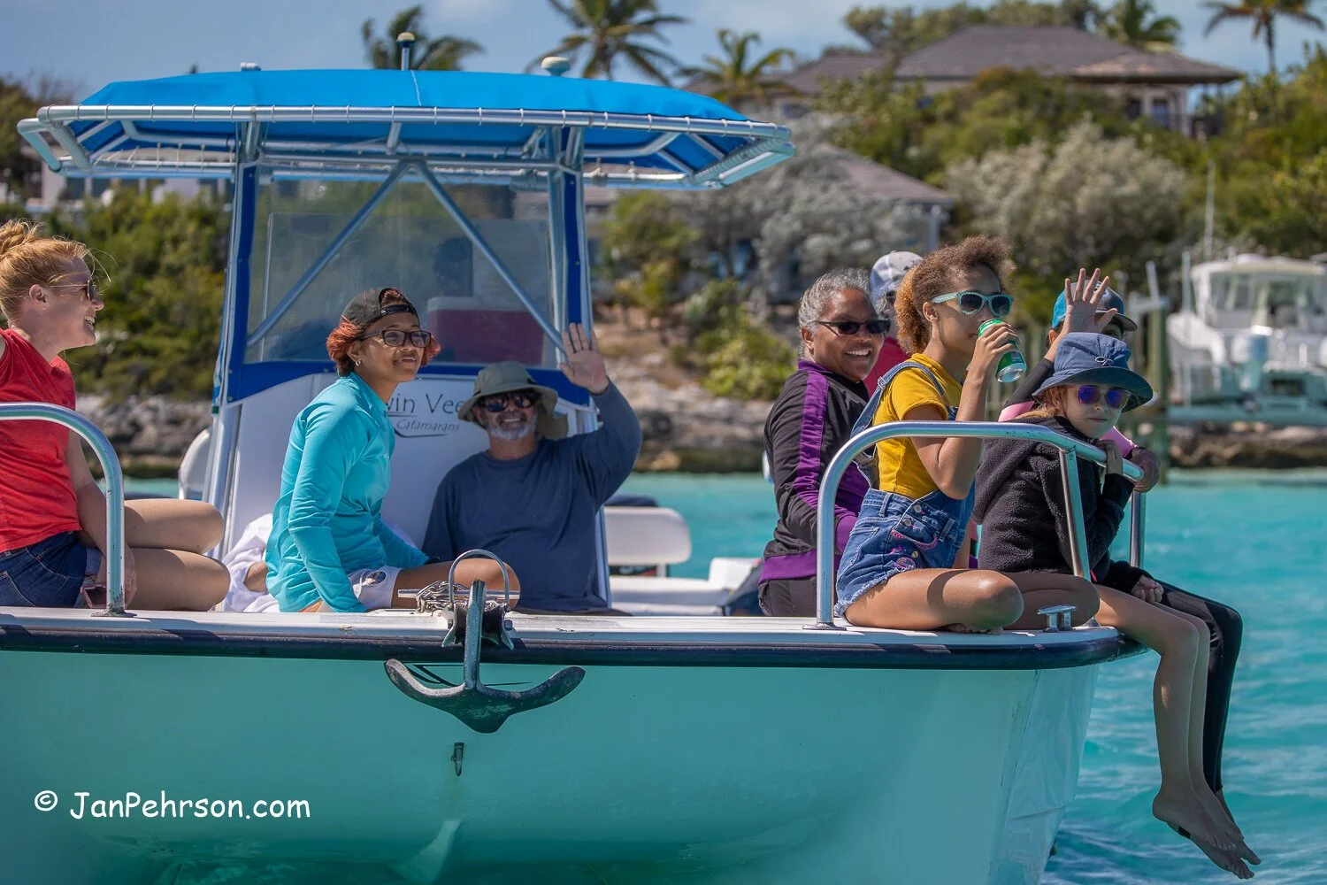 Spectators and fans cheer the Opti Sailors fighting for the lead in 20 mph gusty winds and 3 to 4 foot choppy seas