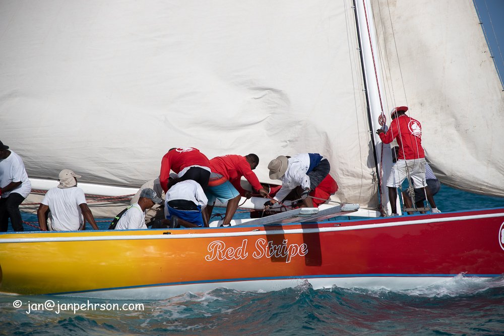 April 2019, George Town, Exuma, Bahamas, Family Island Regatta Day 2 of Championship, A Class, Red Stripe (0987)