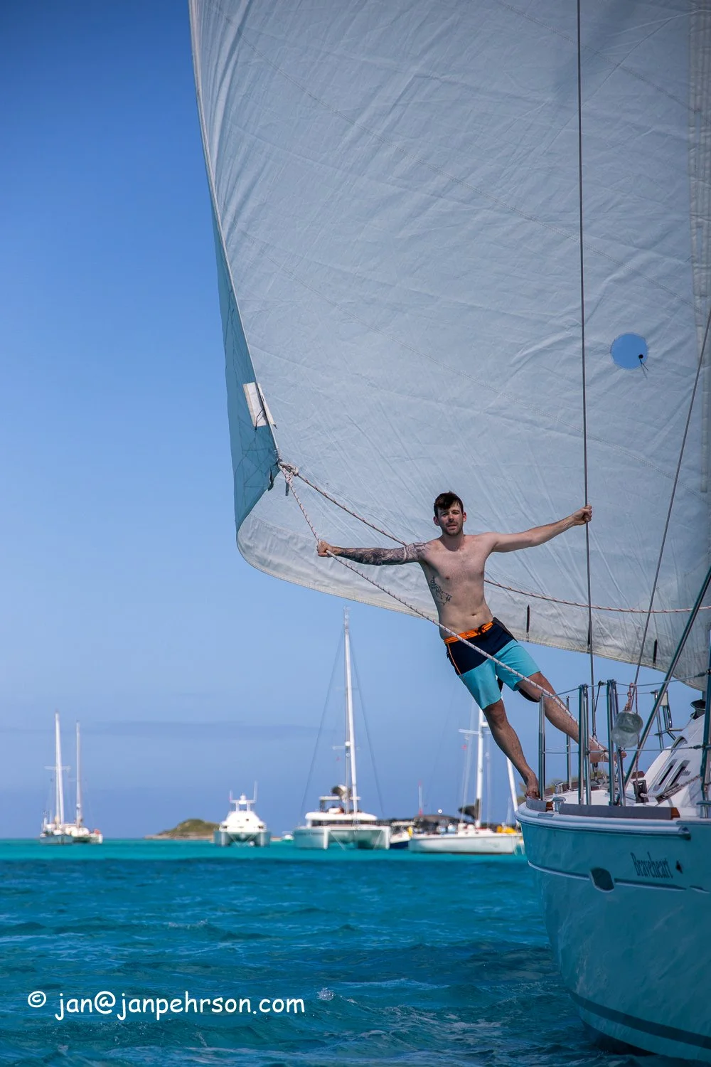Feb 2019, Stocking Island, George Town, Exuma, Bahamas, Cruisers Regatta, In-Harbor Race, Braveheart, Kyle practices being a human whisker pole