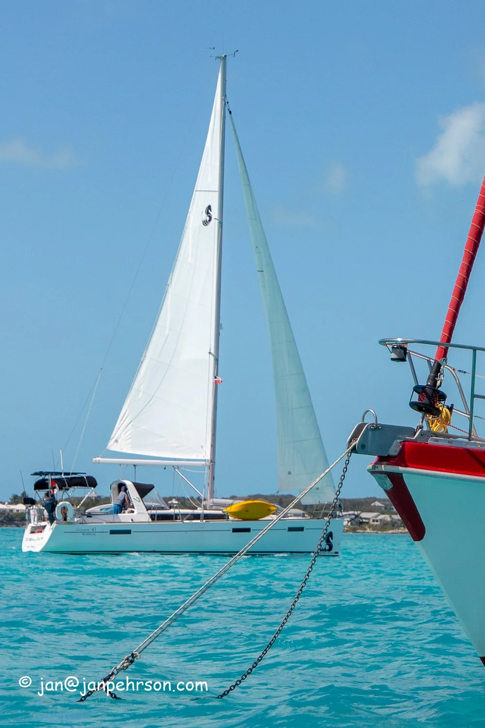 Feb 2019, Stocking Island, George Town, Exuma, Bahamas, Cruisers Regatta, In-Harbor Race, Boats in Race sail through the Stocking Island Anchorage