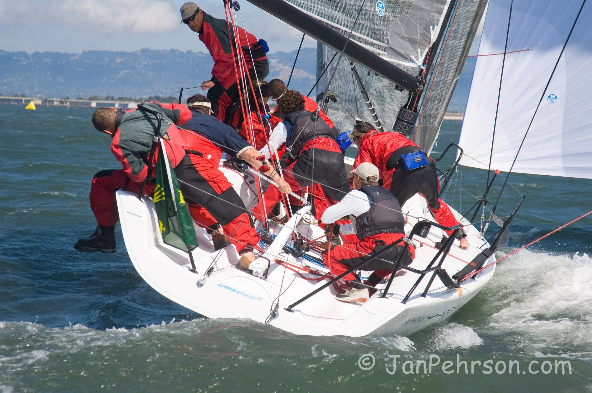 Rolex 2007 Big Boat Series San Francisco - Melges 32 - Pegasus - Skipper:  Philippe Kahn - Crew executes a perfect Roll Gybe to a win in the Rolex Big Boat Series, September 2007 (02956)