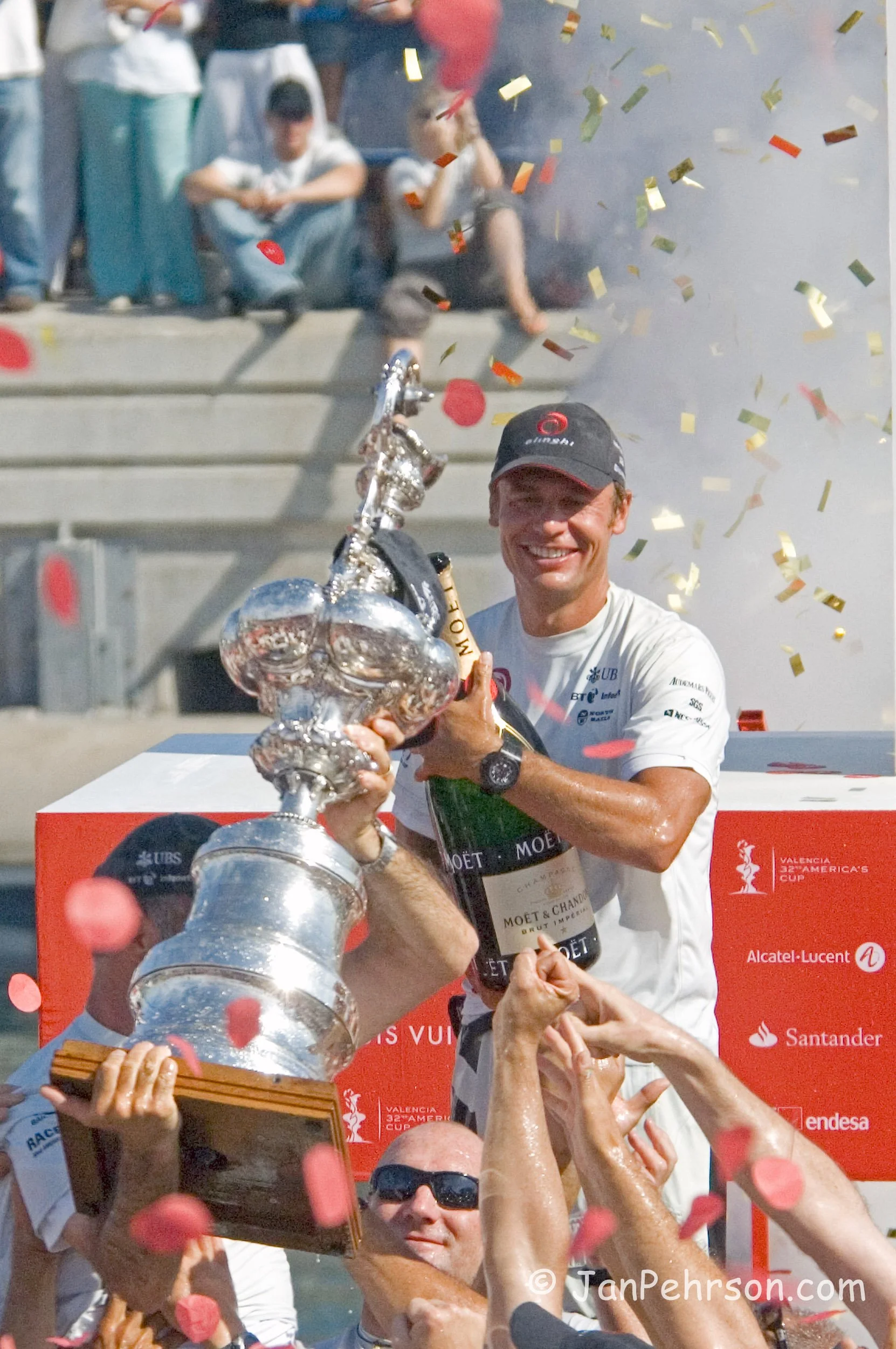 America's Cup Match - Final Race 2007, Alinghi wins over Emirates Team New Zealand by 1 second. Syndicate head Ernesto Bertarelli celebrates with champagne (01325)