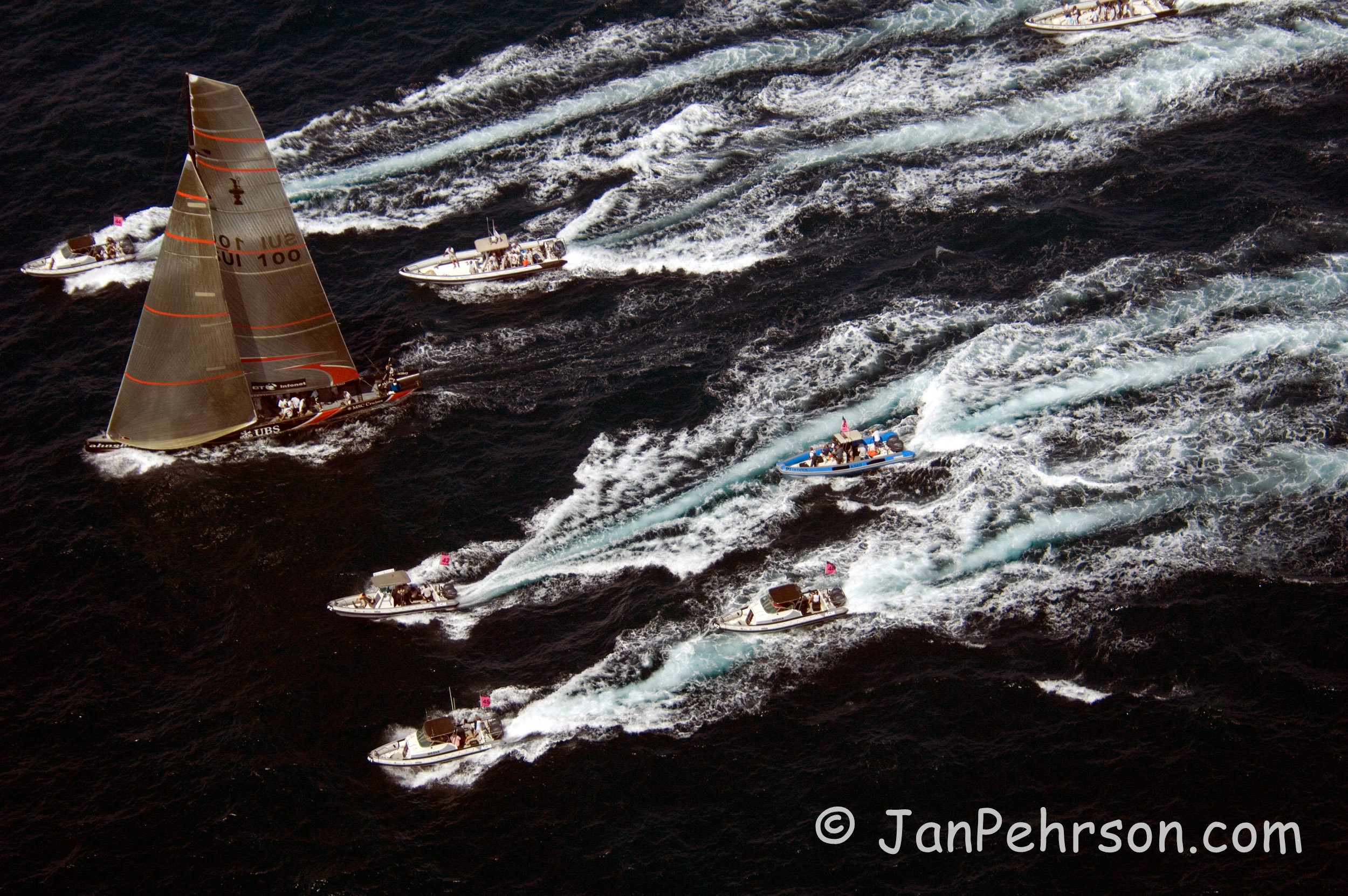 America's Cup Match - Final Race 2007, Alinghi wins over Emirates Team New Zealand by 1 second. The Yacht Alinghi with a flotilla of spectator boats after the race (00983)