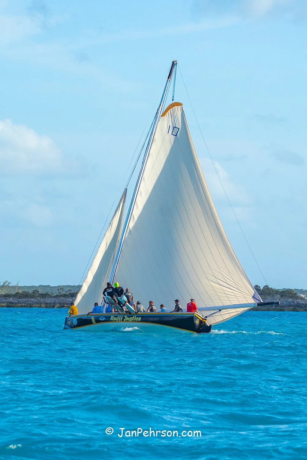 April 2026, George Town, Bahamas, National Family Island Regatta, A-Class, Ruff Justice, from Long Island