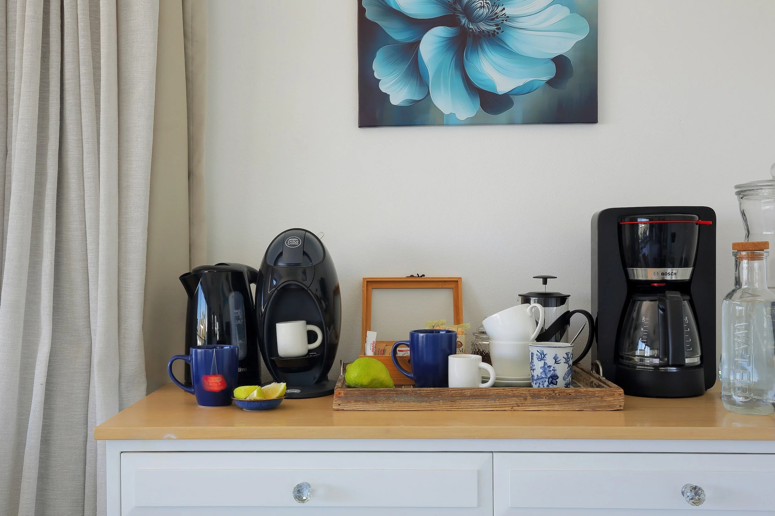 In-room coffee station with kettle, espresso machine and complimentary tea setup at Mykonos Guest House, St Francis Bay.
