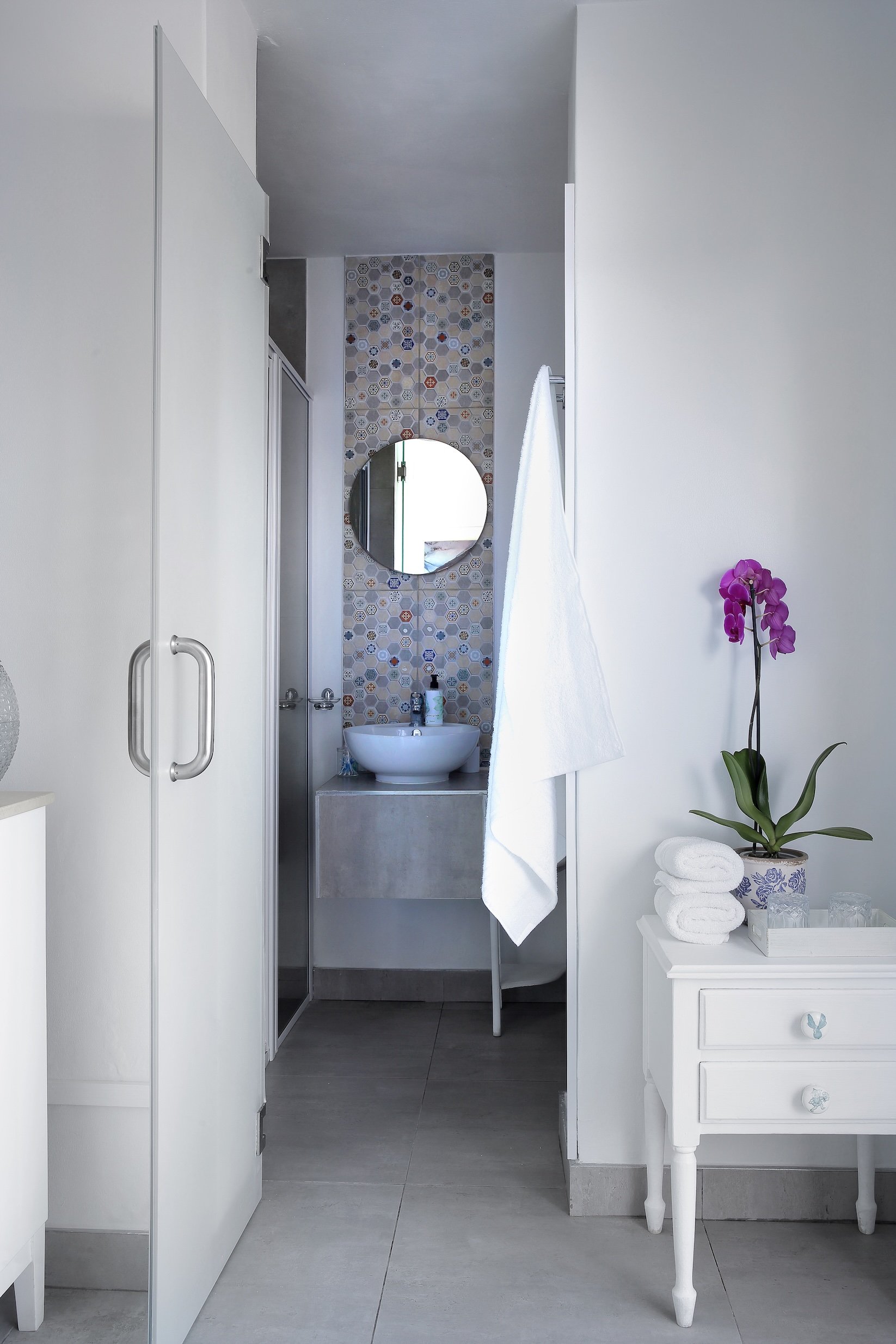 En-suite bathroom entrance in upper deck sea-facing room at Mykonos Luxury Guest House.