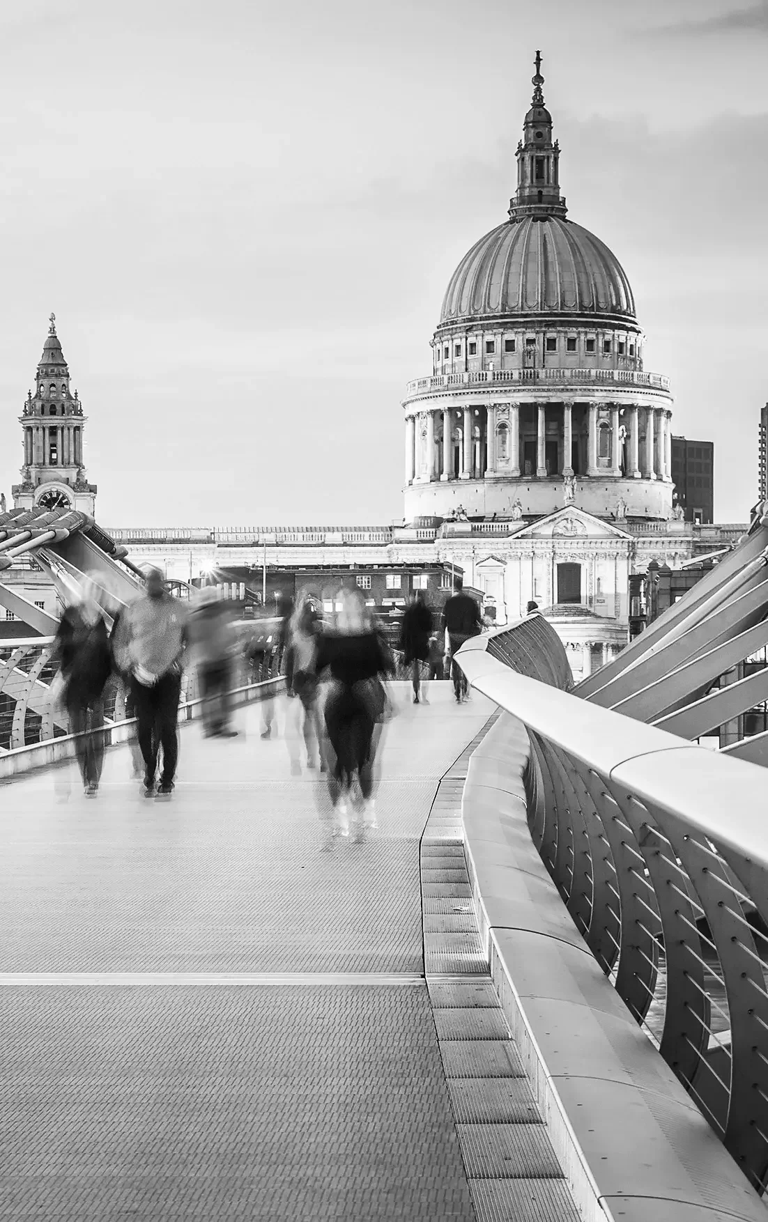 Black and white view of the Millennium Bridge with St Paul's Cathedral London