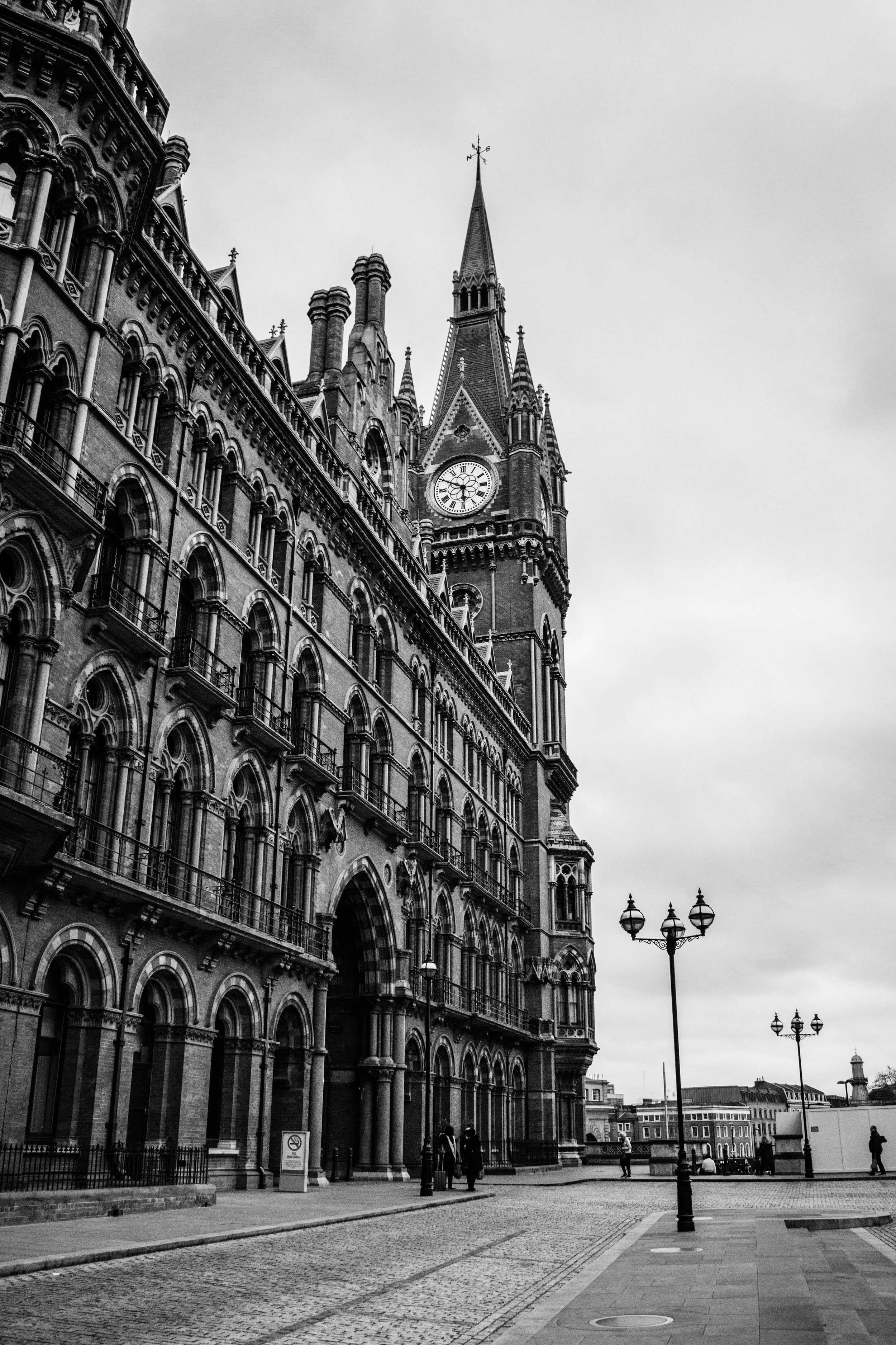 Black and white exterior view of St Pancras station London where leadership coach John Dyson works regularly