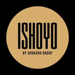 Logo van Ishuyo door Shokudo Group op een gouden cirkel met zwarte achtergrond.