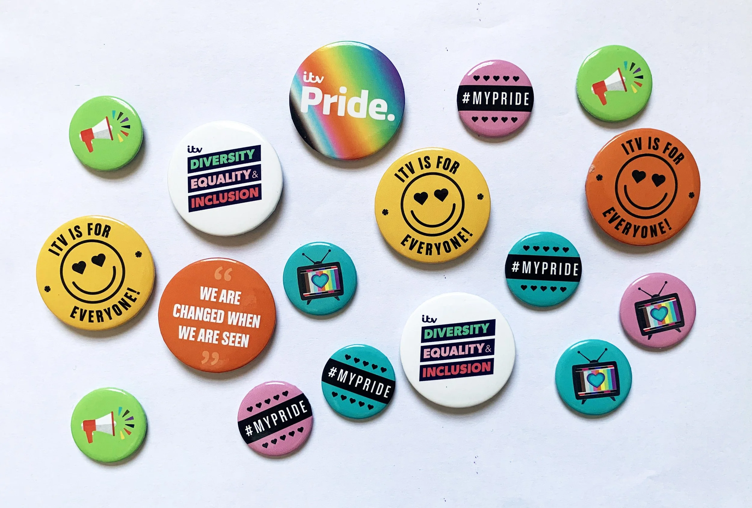 ITV PRIDE BADGES.jpg