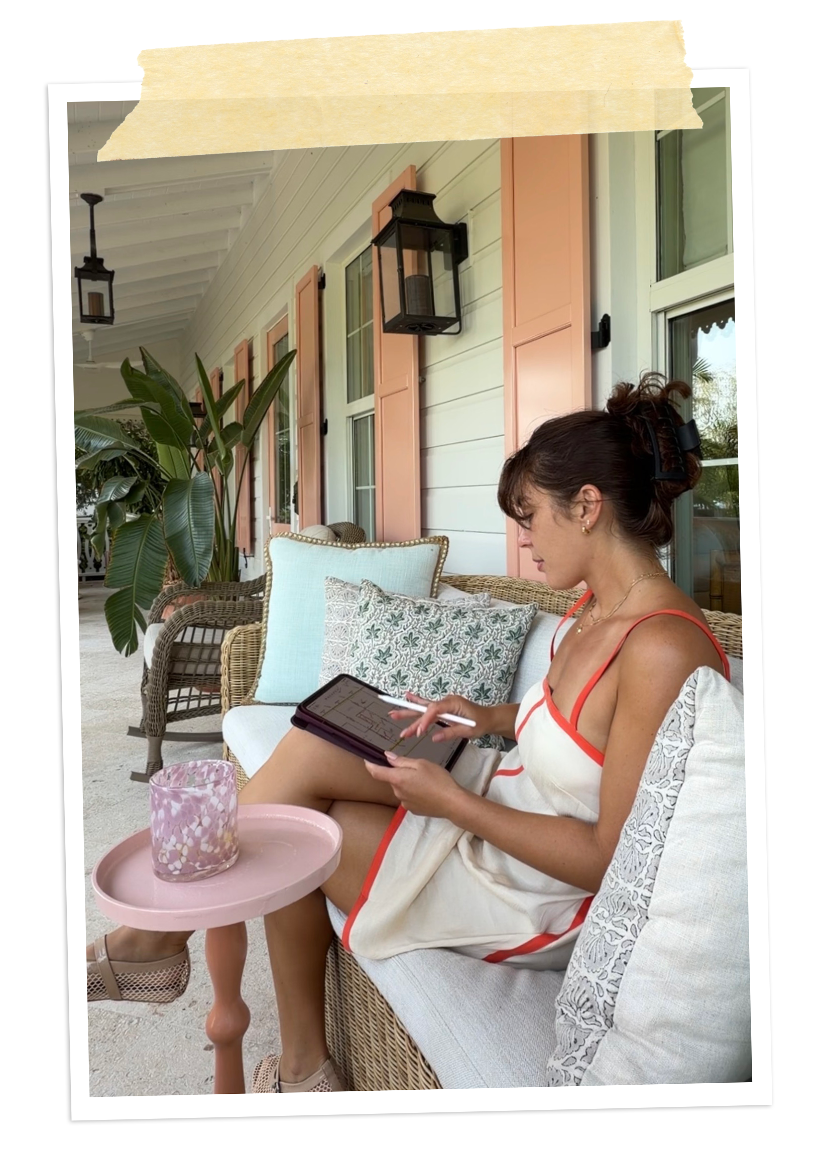 Rafi Inez sketching a home design on her iPad on a porch