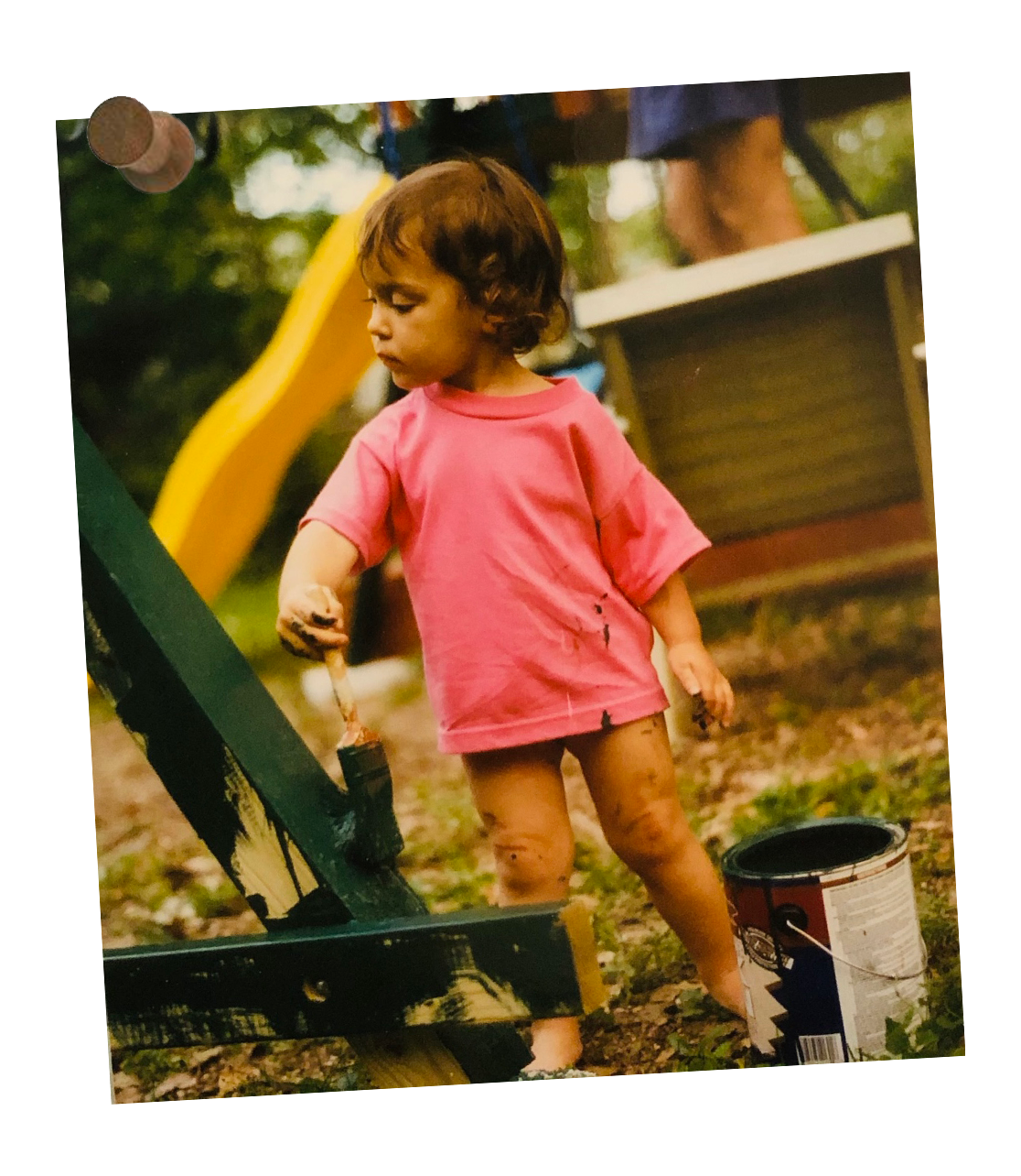 Rafi Inez as a young girl painting the backyard playset at her family’s Craftsman bungalow