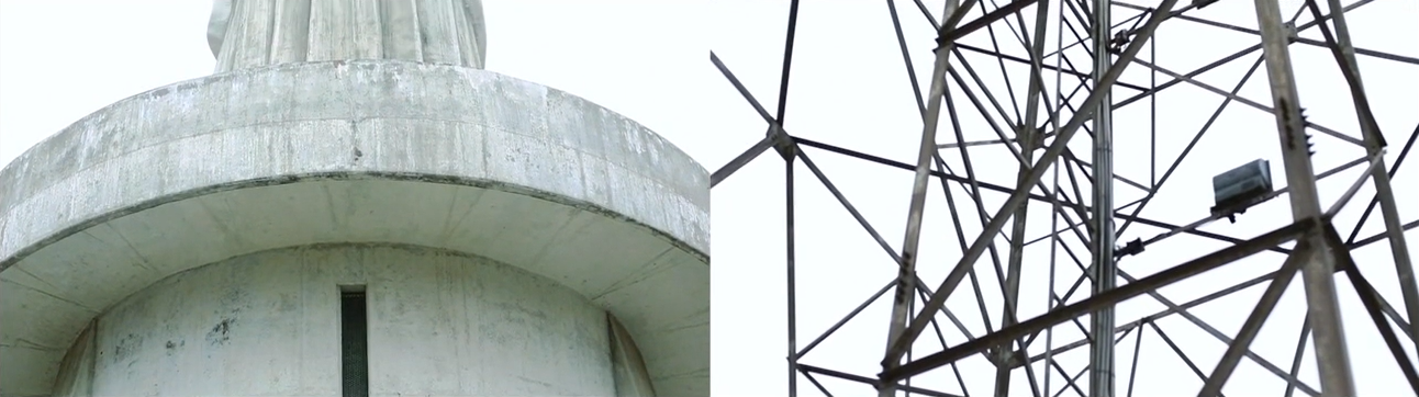 Close-up of a concrete structure on the left and a metal radio tower on the right