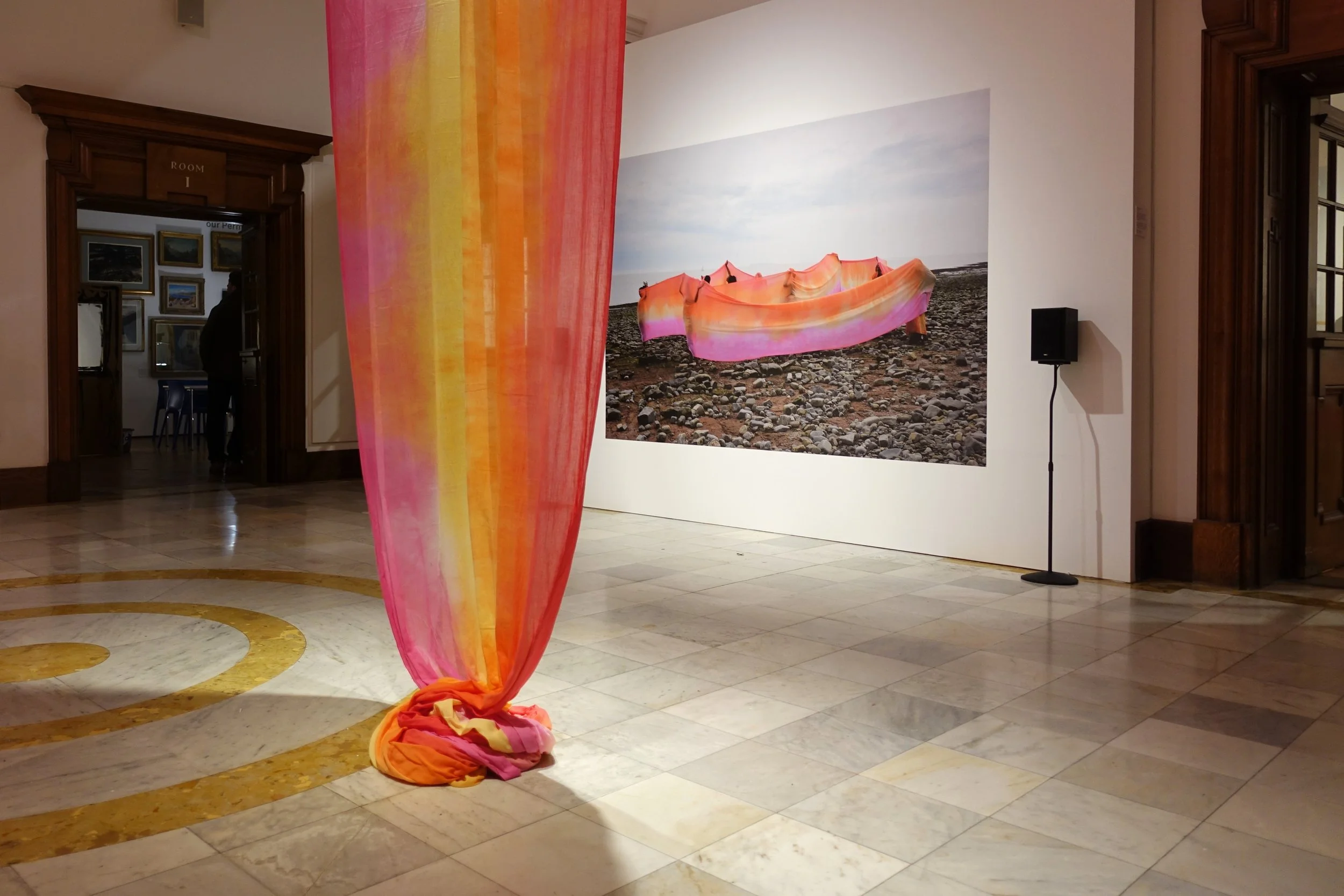Ncheta 2023-24
Created and designed by Aurora Trinity Collective and supported by Artes Mundi.`A large scale textile cascade across the length of the Glynn Vivian Gallery atrium. Alongside the installation, multilingual audio recordings played.This i