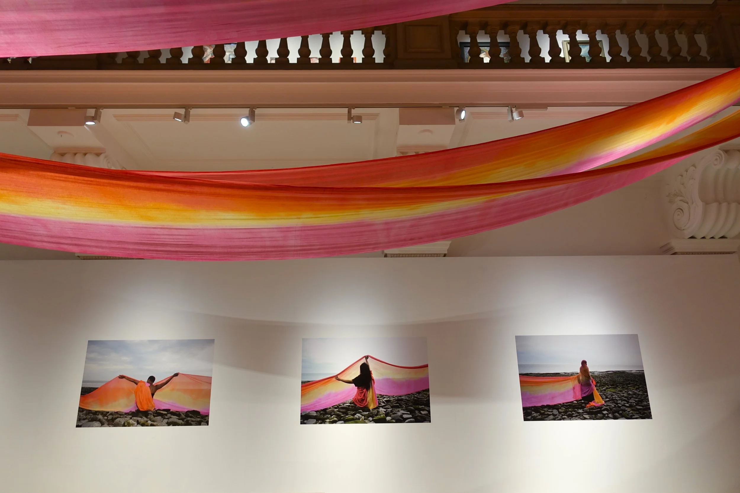 Ncheta 2023-24
Created and designed by Aurora Trinity Collective and supported by Artes Mundi.`A large scale textile cascade across the length of the Glynn Vivian Gallery atrium. Alongside the installation, multilingual audio recordings played.This i