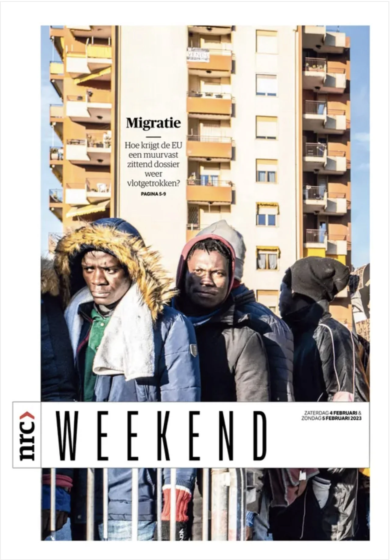 Cover of NRC Weekend magazine featuring a group of Black men in winter clothing standing in front of an apartment building.