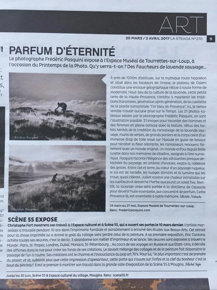 A program or brochure page with text in French about art and photography, including a photograph of a landscape with clouds and fields, and details about an art exhibition and a photographer's work.