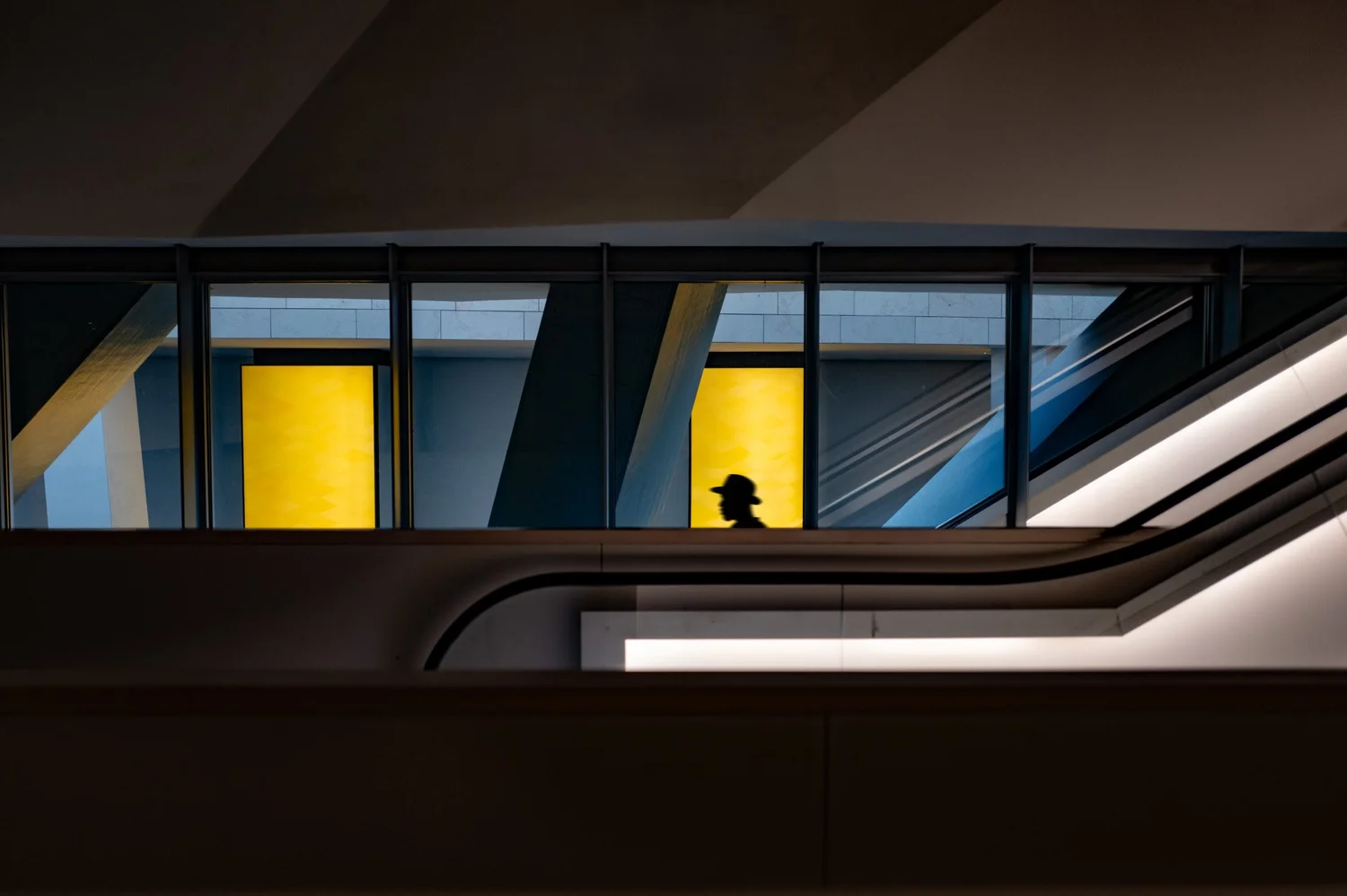 Person in an institutional architectural environment