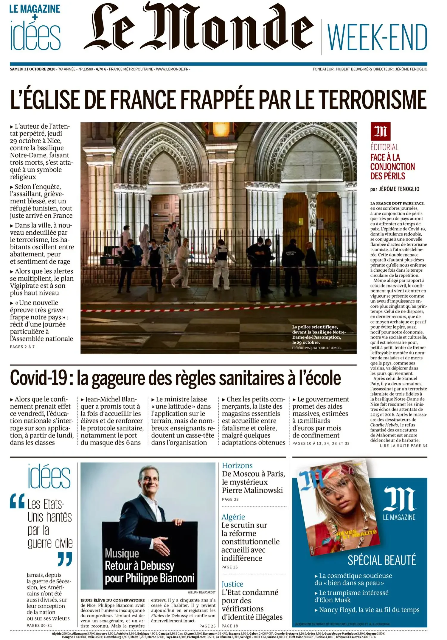 Outside view of the Notre-Dame basilica in Nice, underscored by police officers and a police line at night, with people gathered in front.