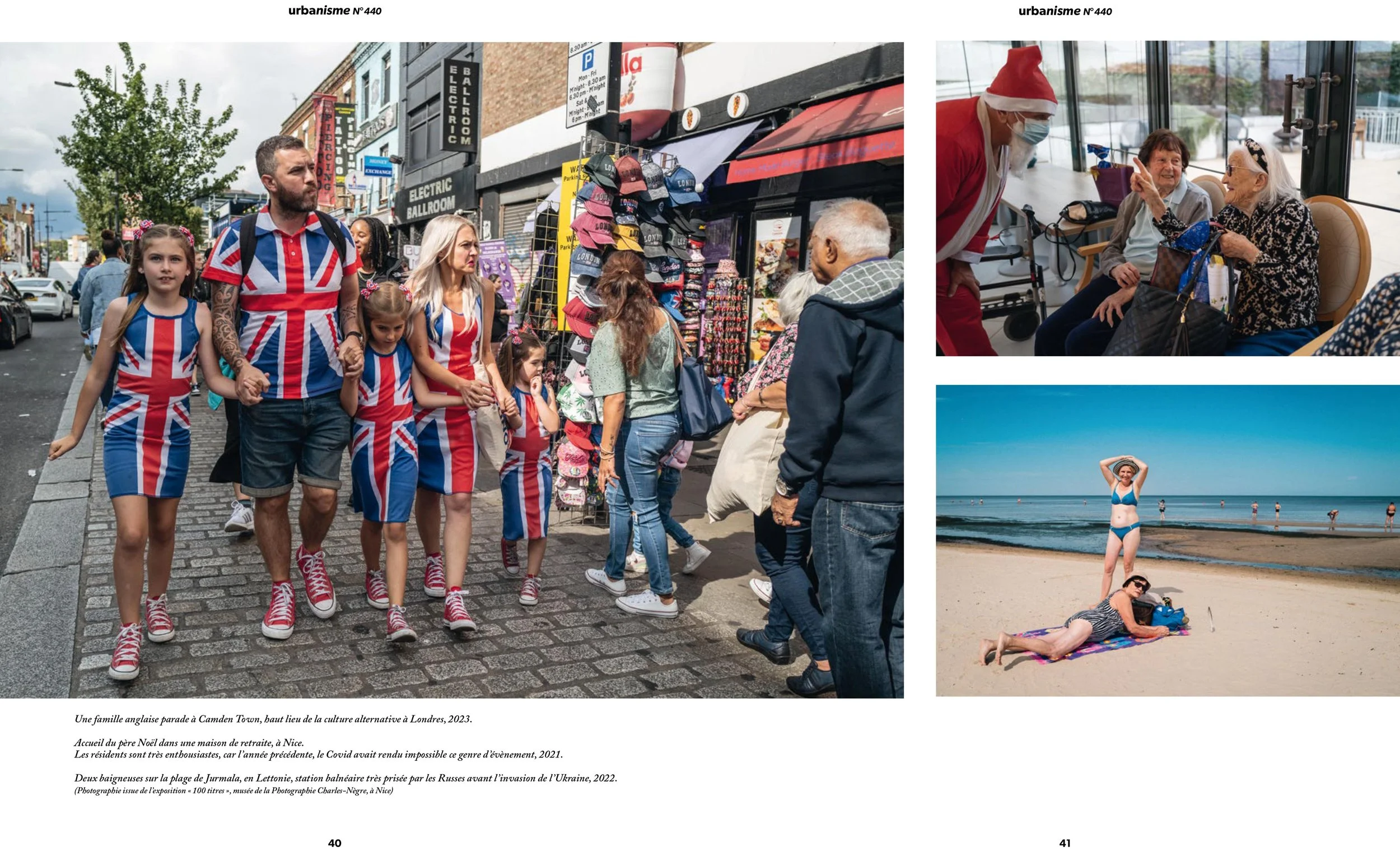 A family dressed in British flag-themed clothing walking on a city street, shops and signs visible in the background.