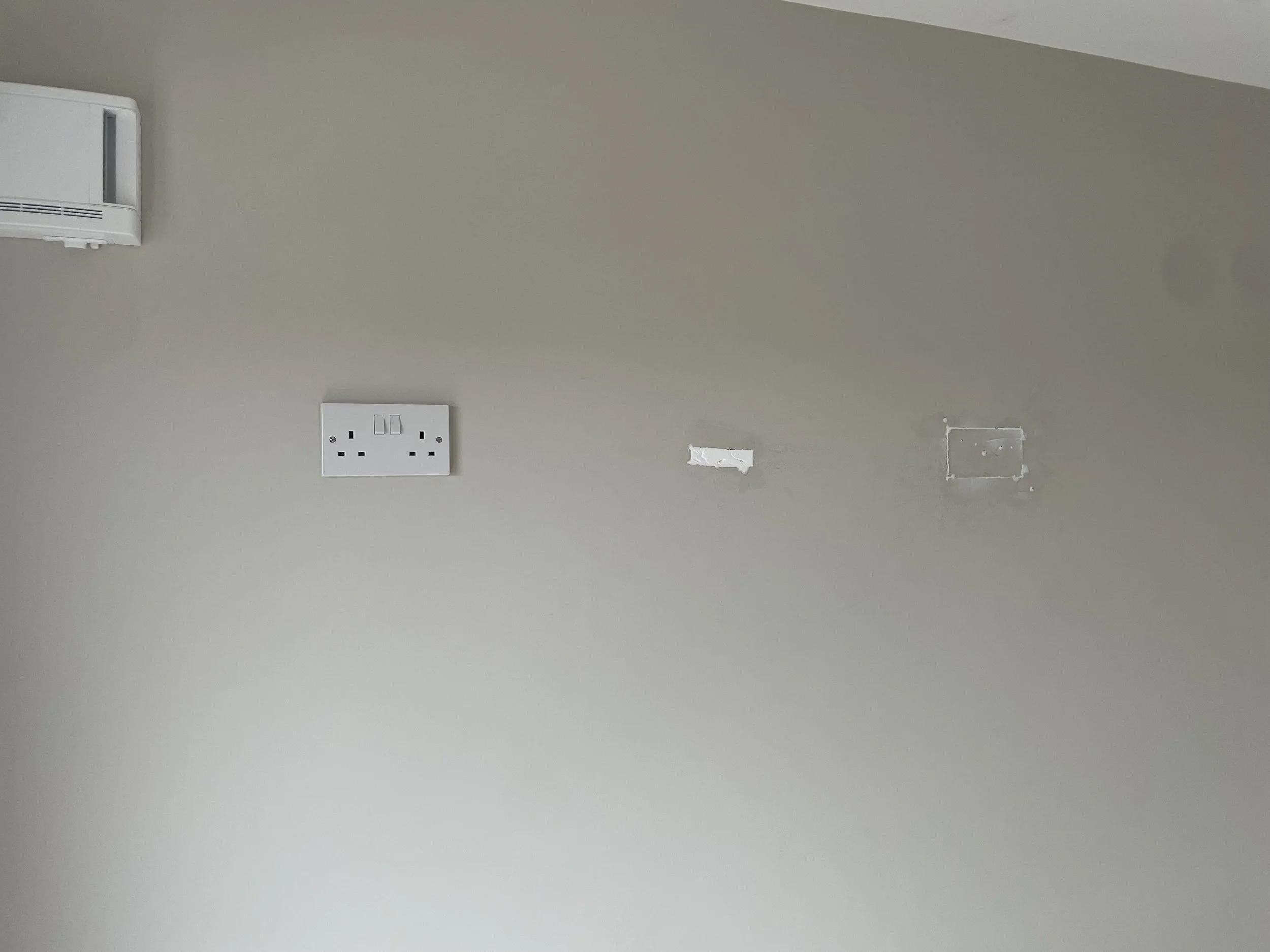 Socket replacement and filled with plasterboard from new cutout