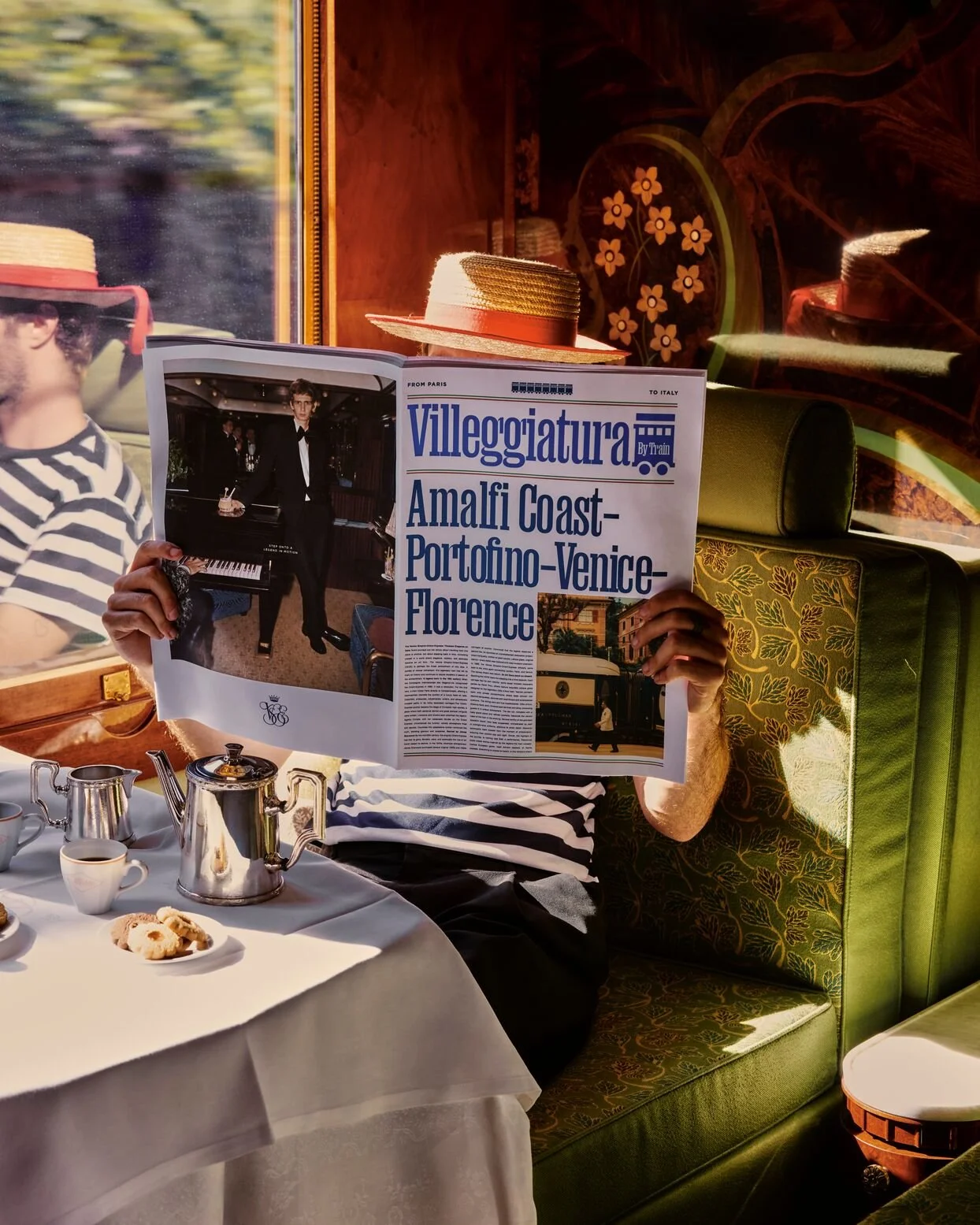 Italian man reading the Amalfi Coast Portifino-Venice-Florence Paper