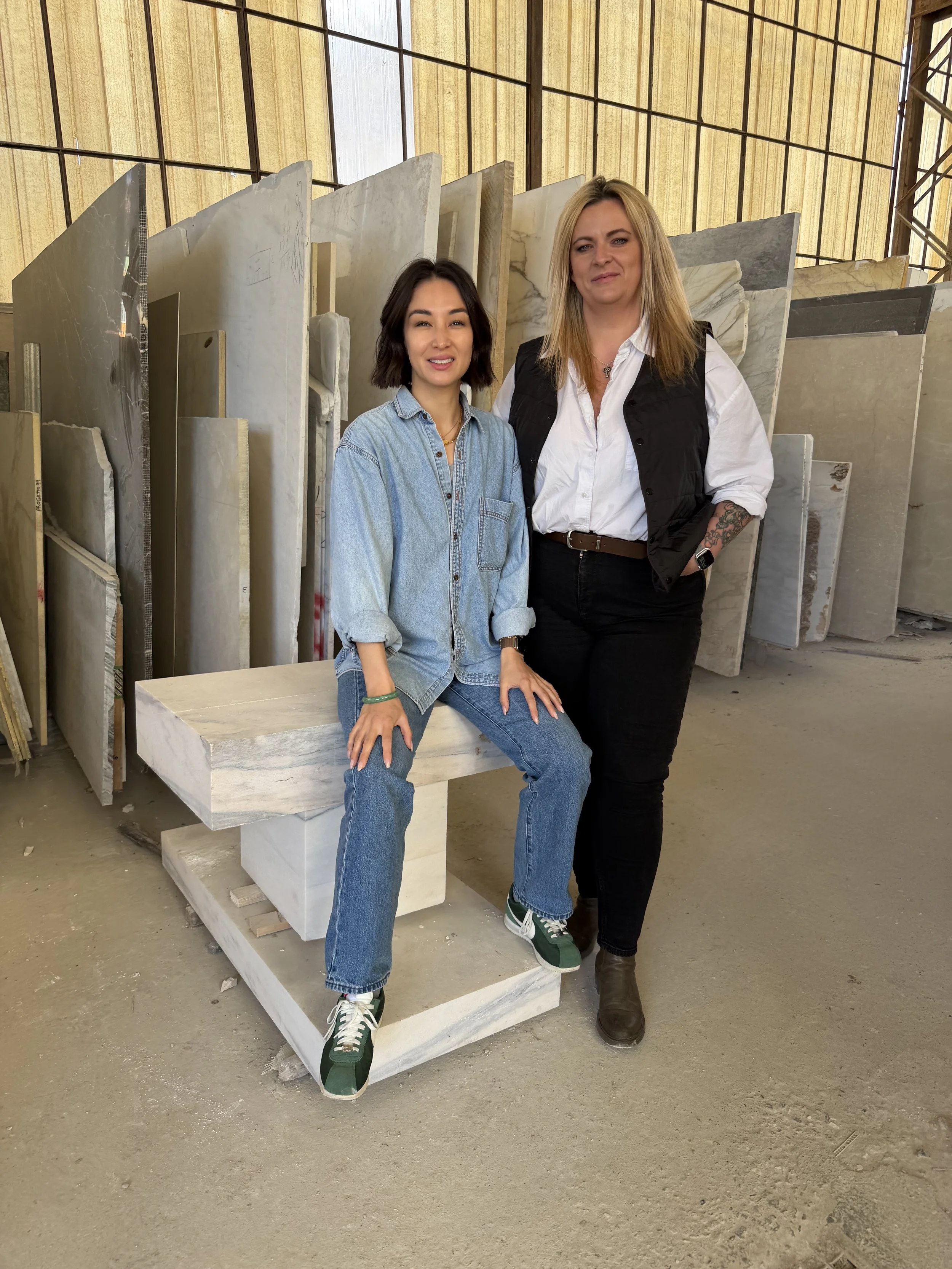 House Mazur founders in stone yard during natural stone selection process