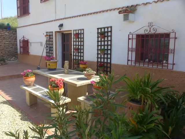welcoming space to sit and chat outside a Spanish house