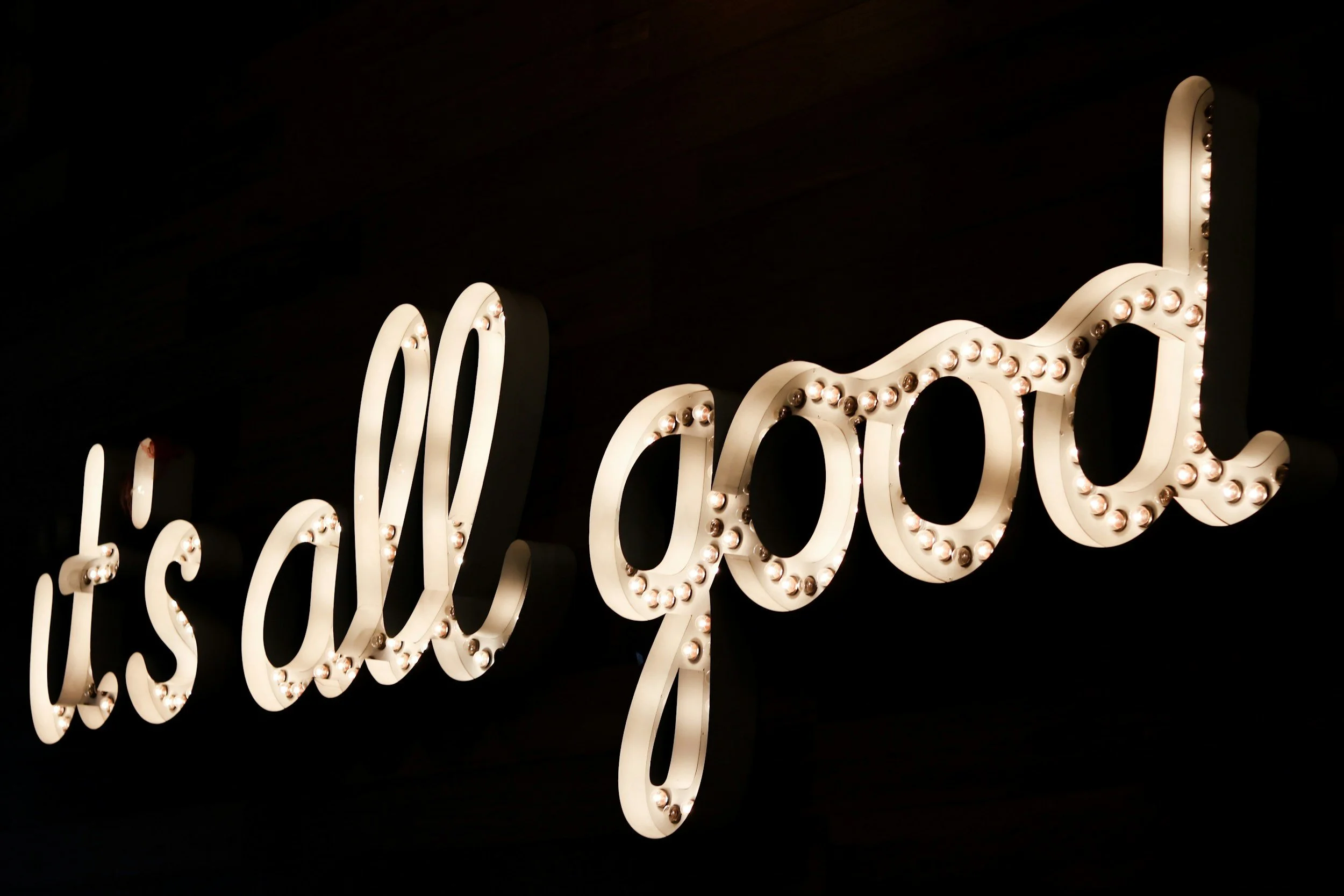 sign saying it's all good in gold letters