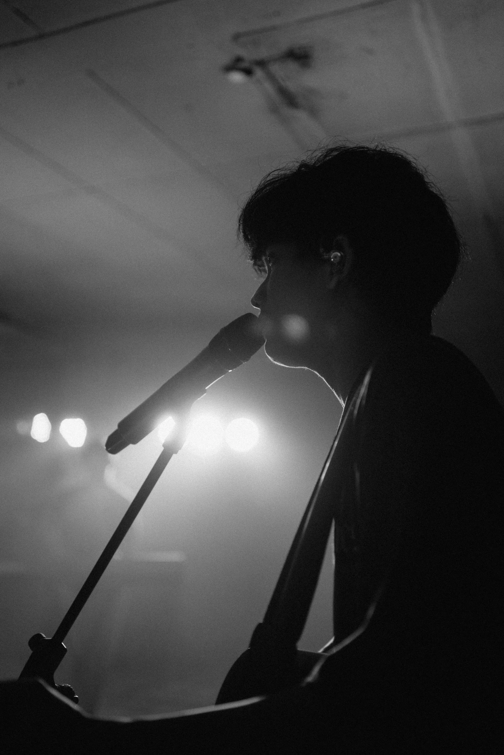 Geometric drawing of an outline square with sections divided by vertical, horizontal, and diagonal lines.