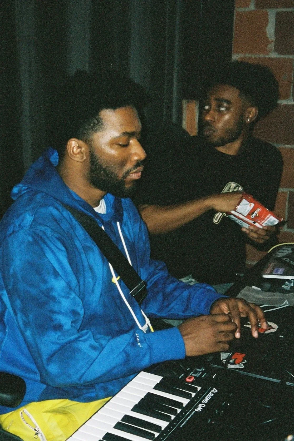 Geometric drawing of an outline square with sections divided by vertical, horizontal, and diagonal lines.