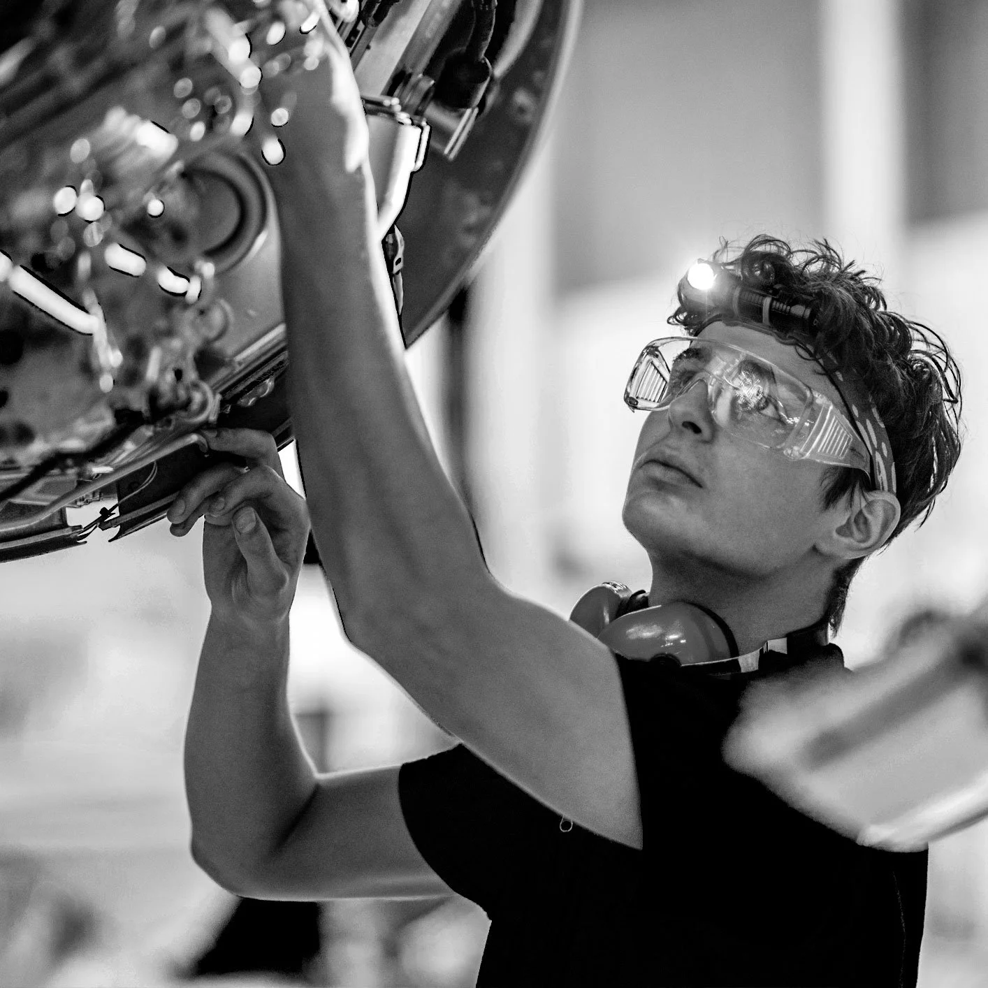 Mechanic working on engine