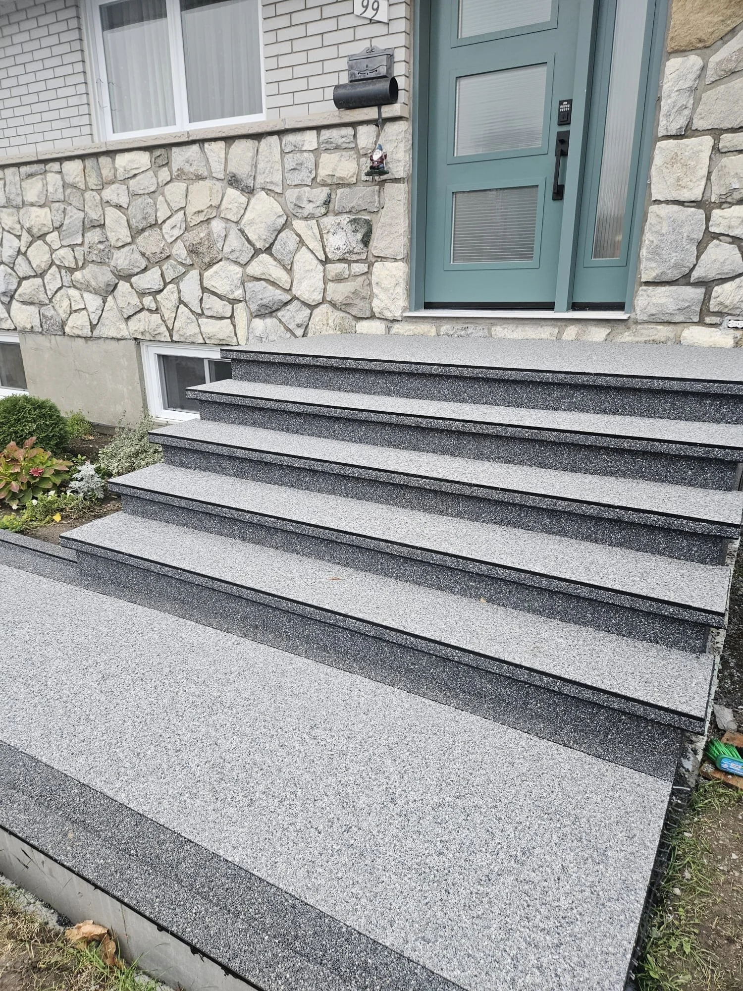 Finished Stone front steps installation at residential home